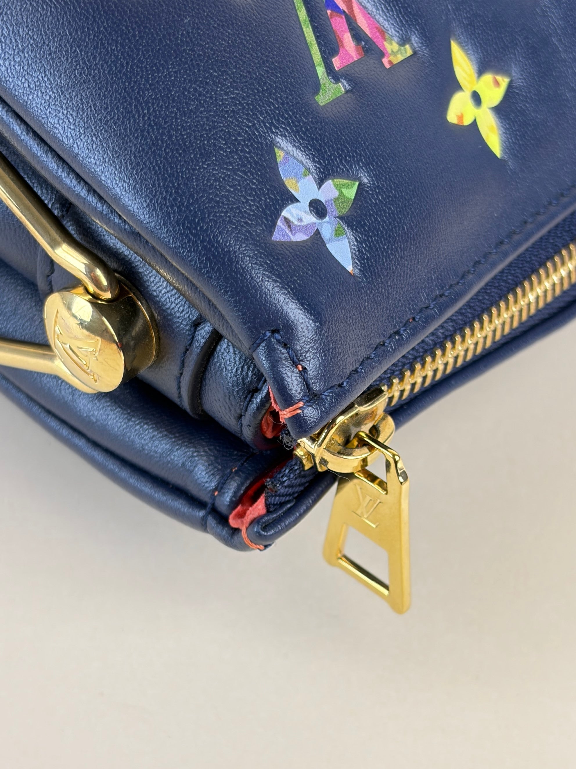 louis Vuitton navy blue lambskin embossed monogram lv garden coissin pm