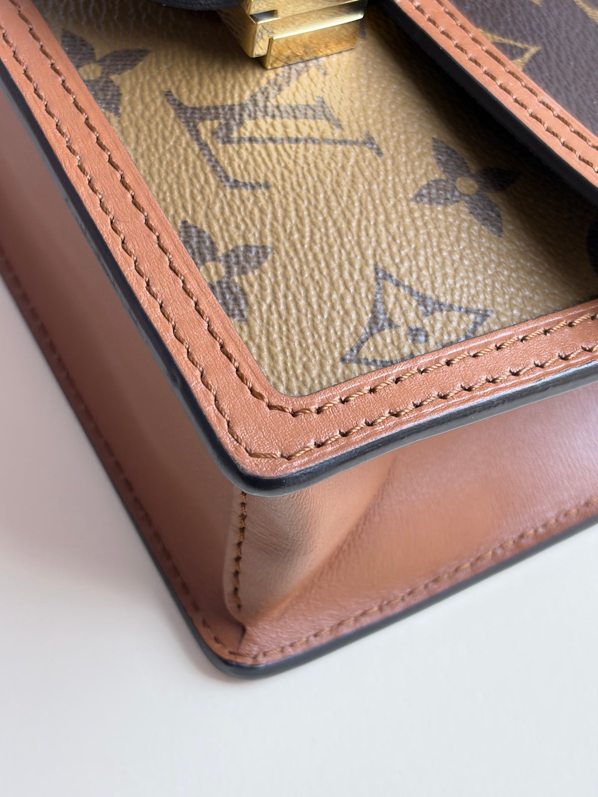 Louis Vuitton Reverse Monogram Dauphine chain wallet
