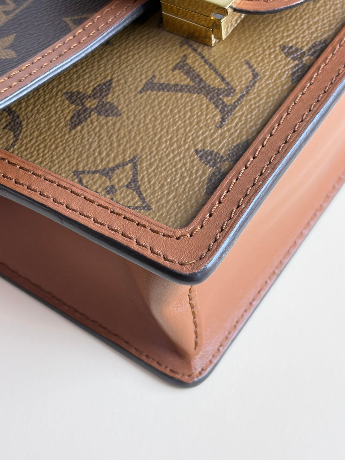 Louis Vuitton Reverse Monogram Dauphine chain wallet