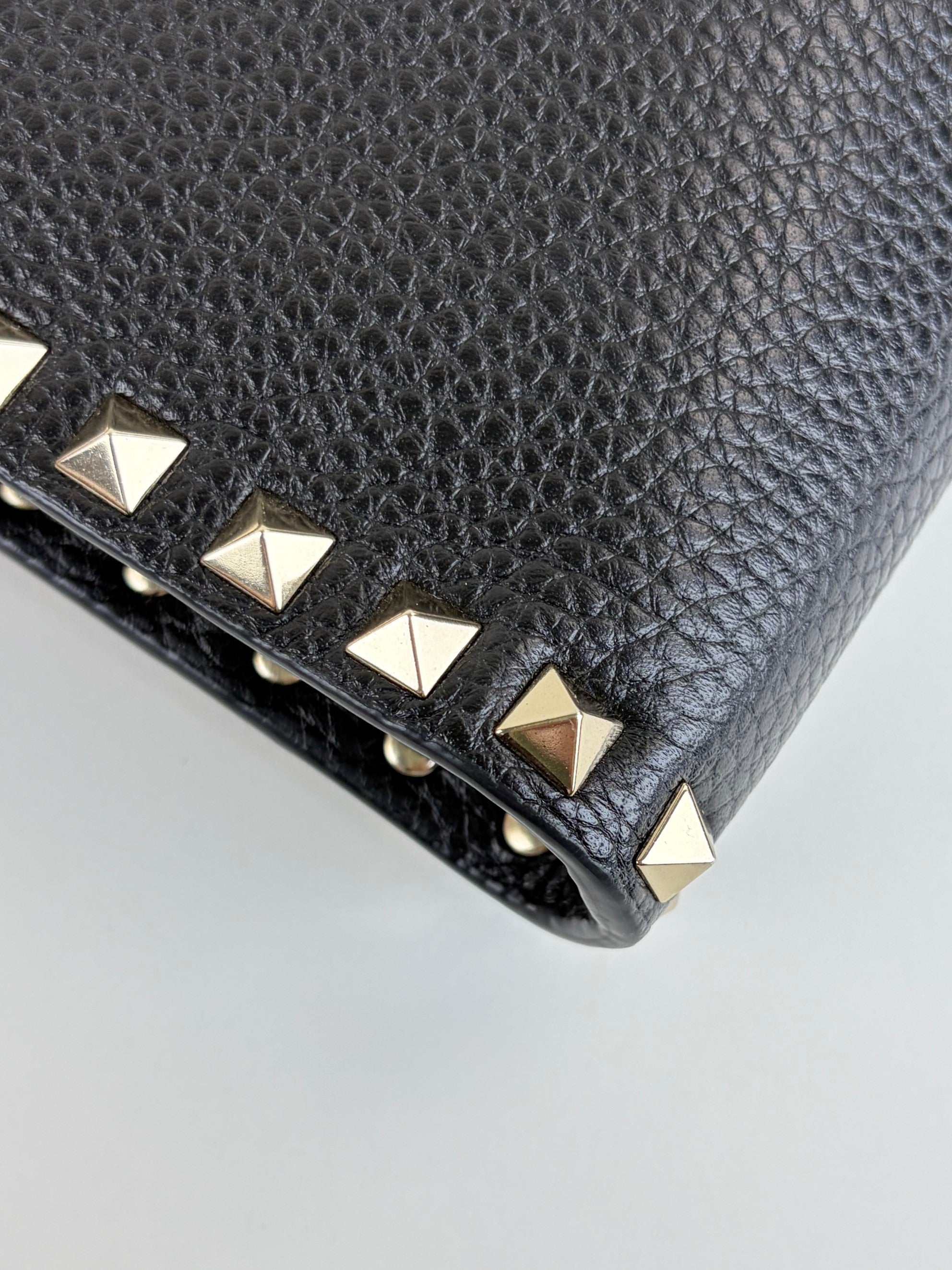 Valentino Black pebbled calfskin rock stud medium zip pouch