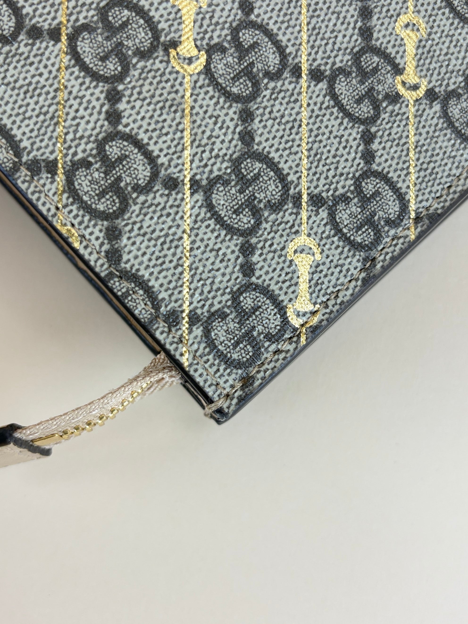 Gucci beige gg supreme monogram canvas and calfskin with gold horse bit print pouch