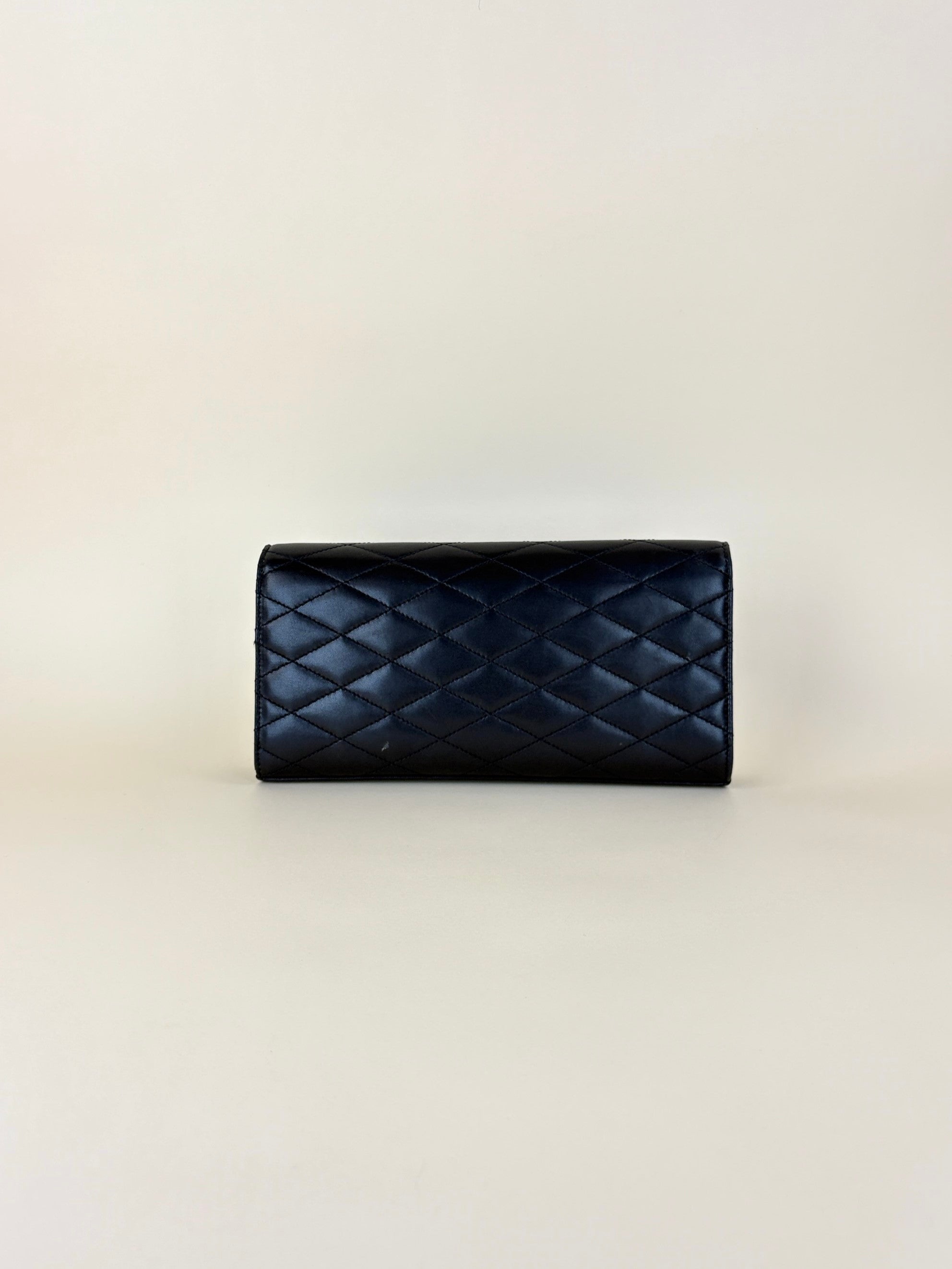 ysl black lambskin quilted Kate clutch