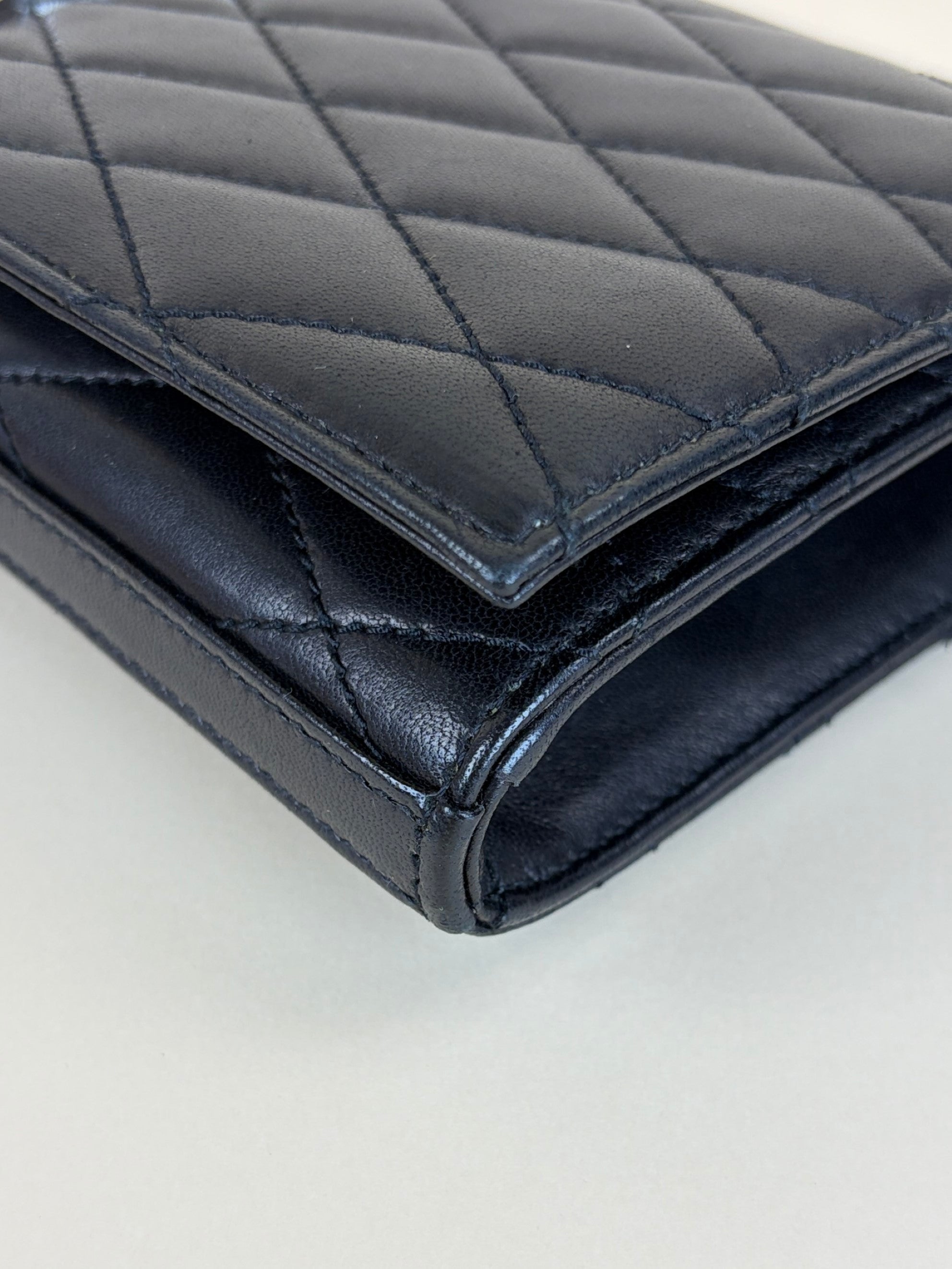 ysl black lambskin quilted Kate clutch