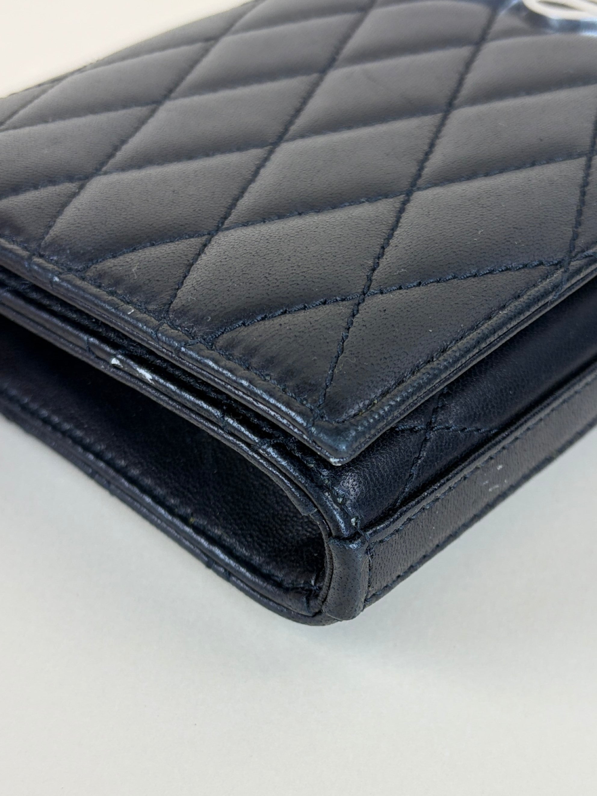 ysl black lambskin quilted Kate clutch