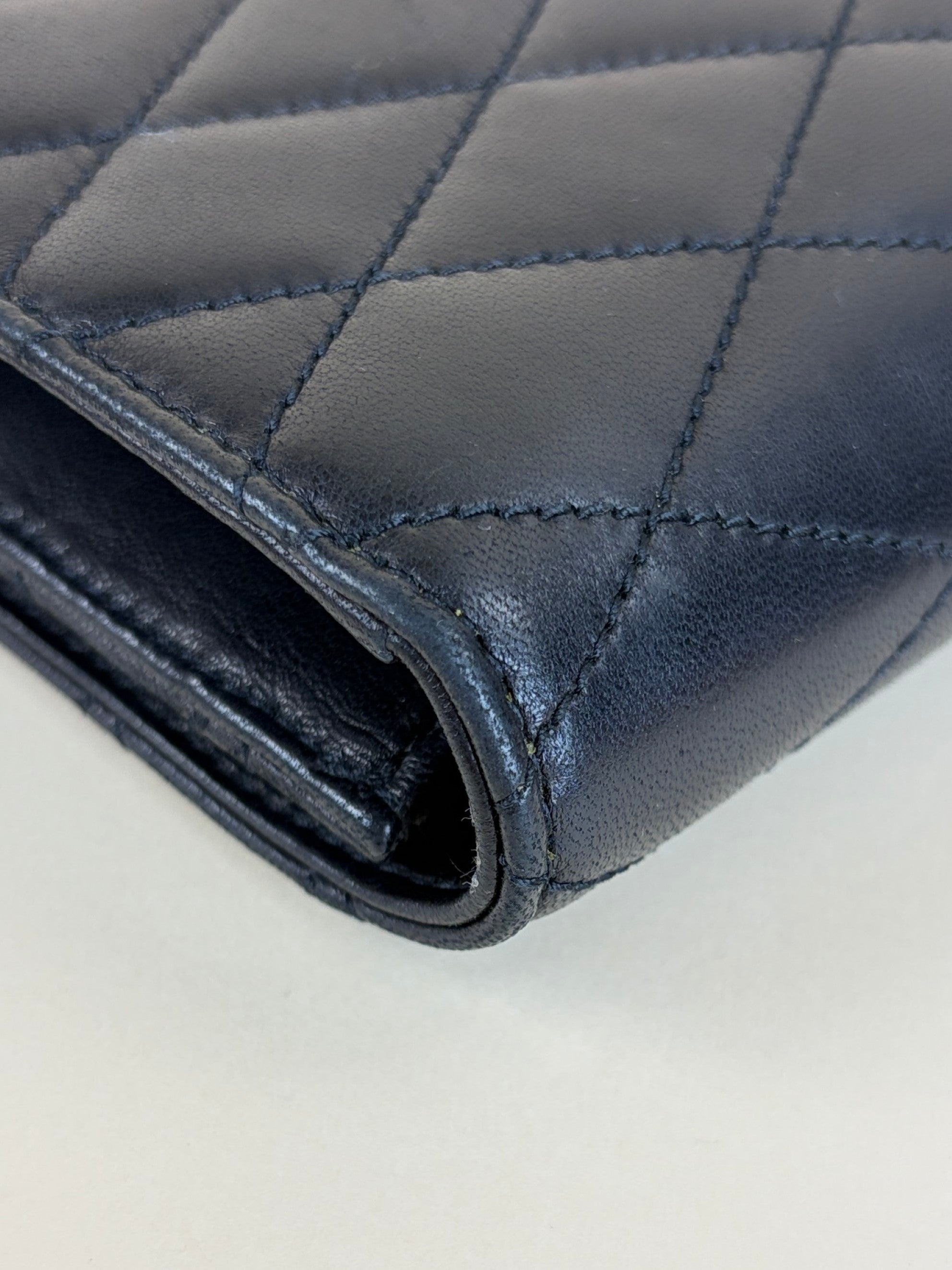 ysl black lambskin quilted Kate clutch