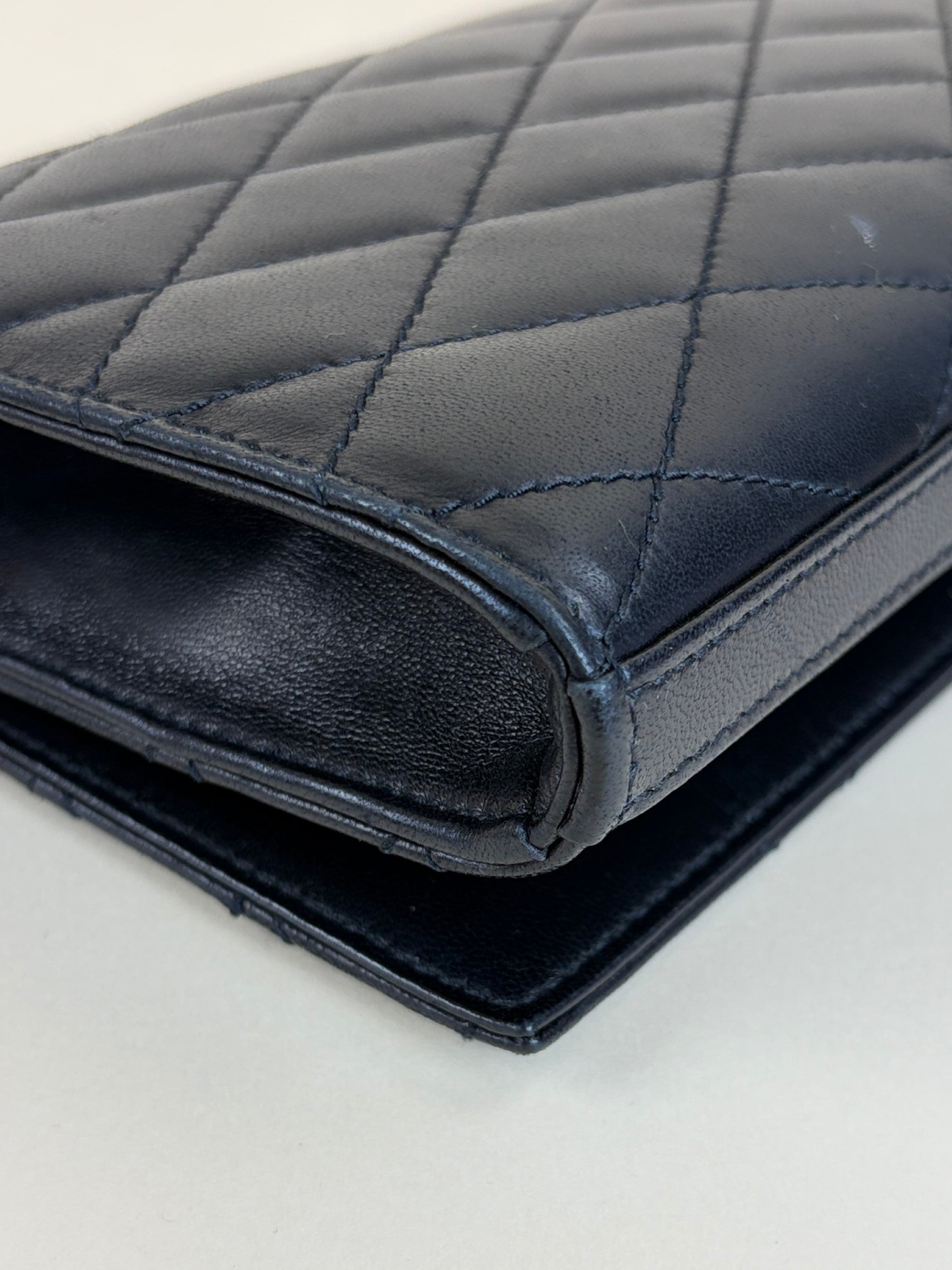 ysl black lambskin quilted Kate clutch