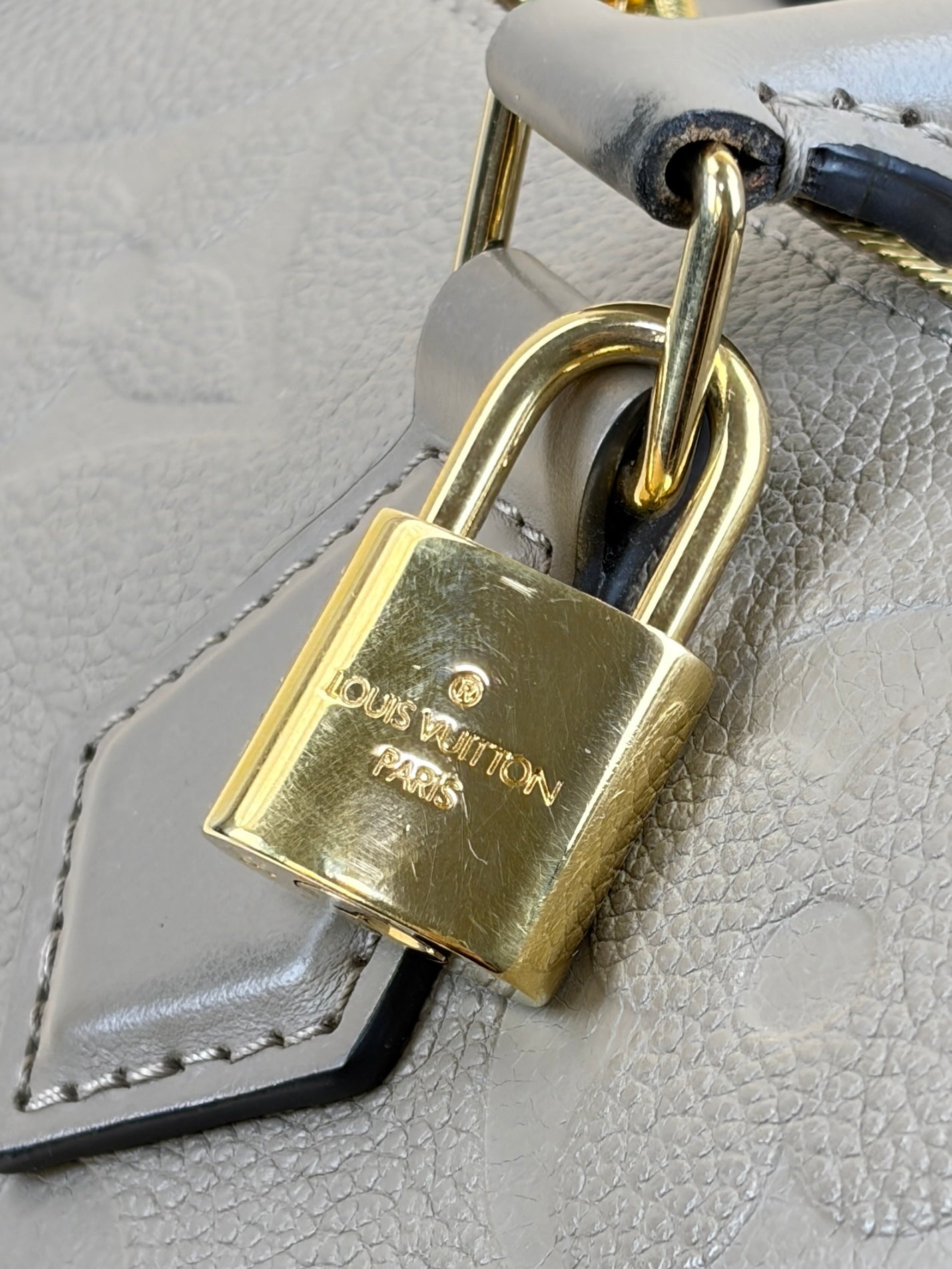 louis Vuitton turtledove monogram empreinte speedy bandouliere 25