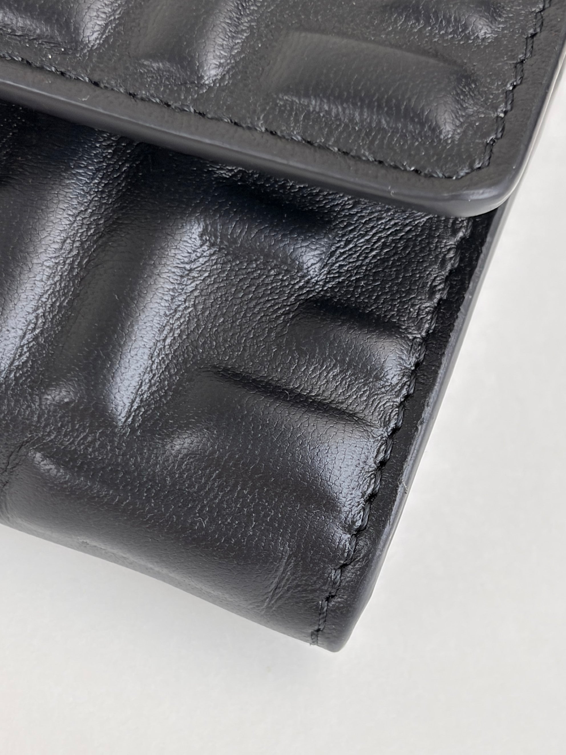 Fendi black embossed ff baguette continental wallet on chain
