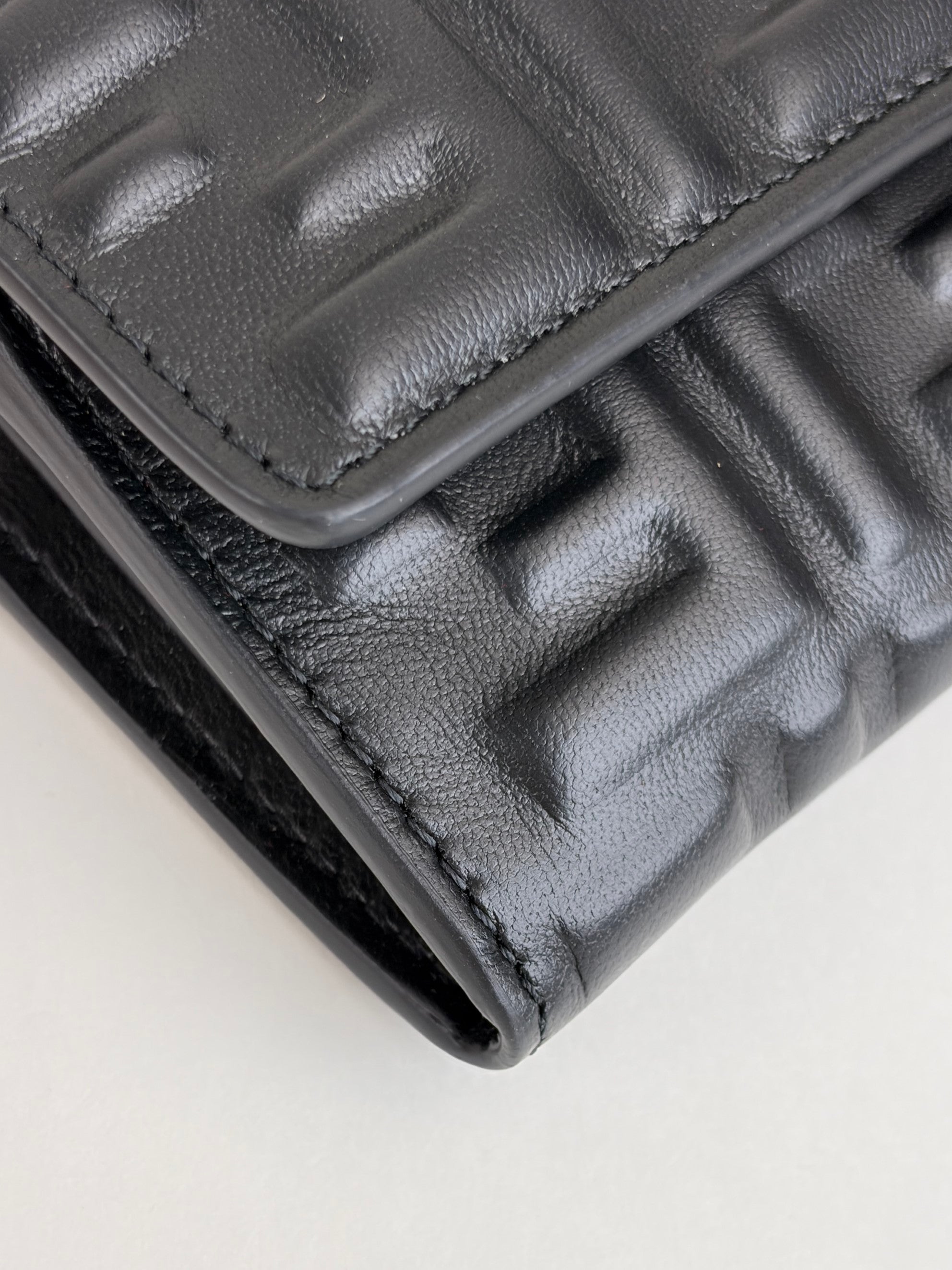 Fendi black embossed ff baguette continental wallet on chain