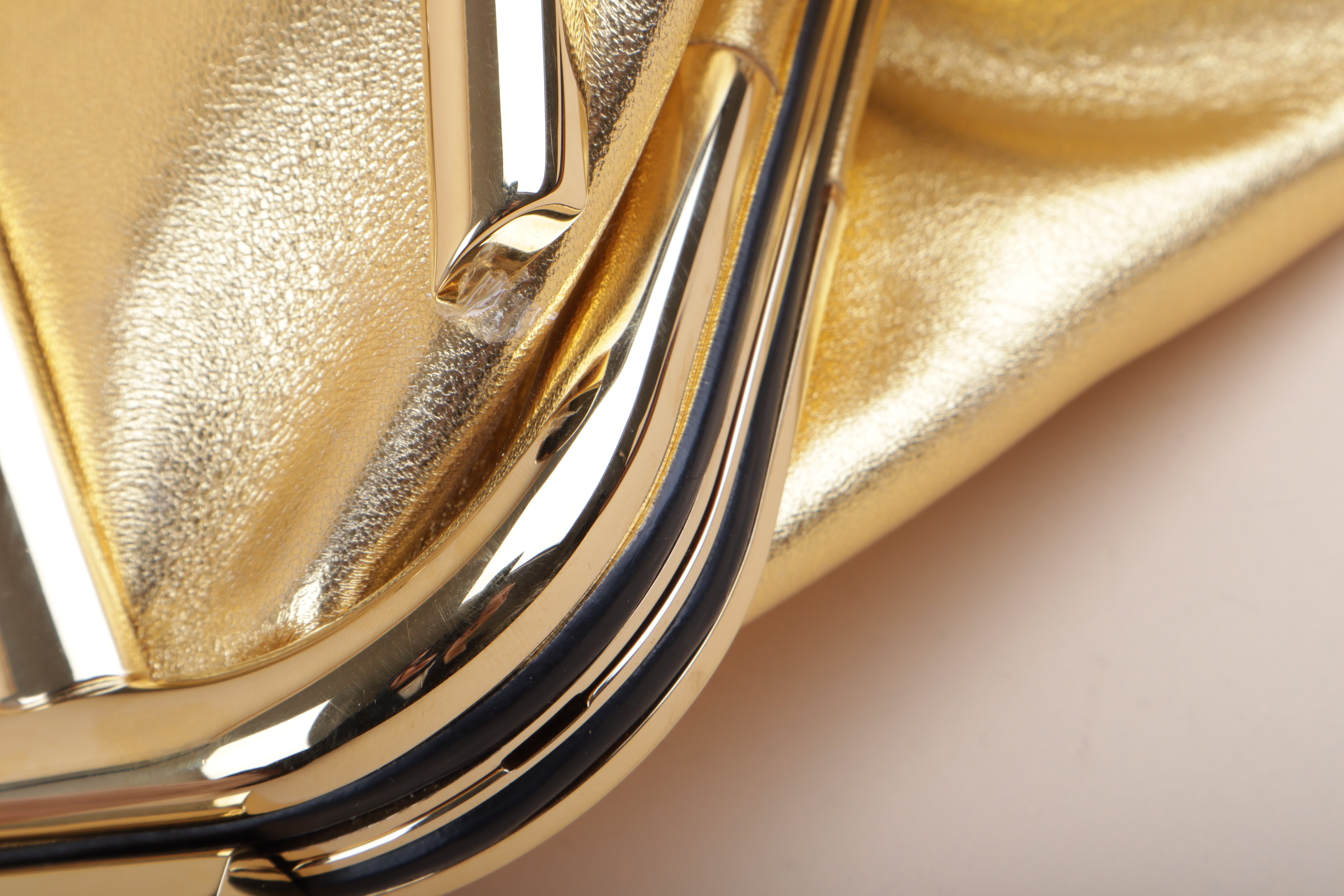 Valentino super Vee clutch and crossbody gold