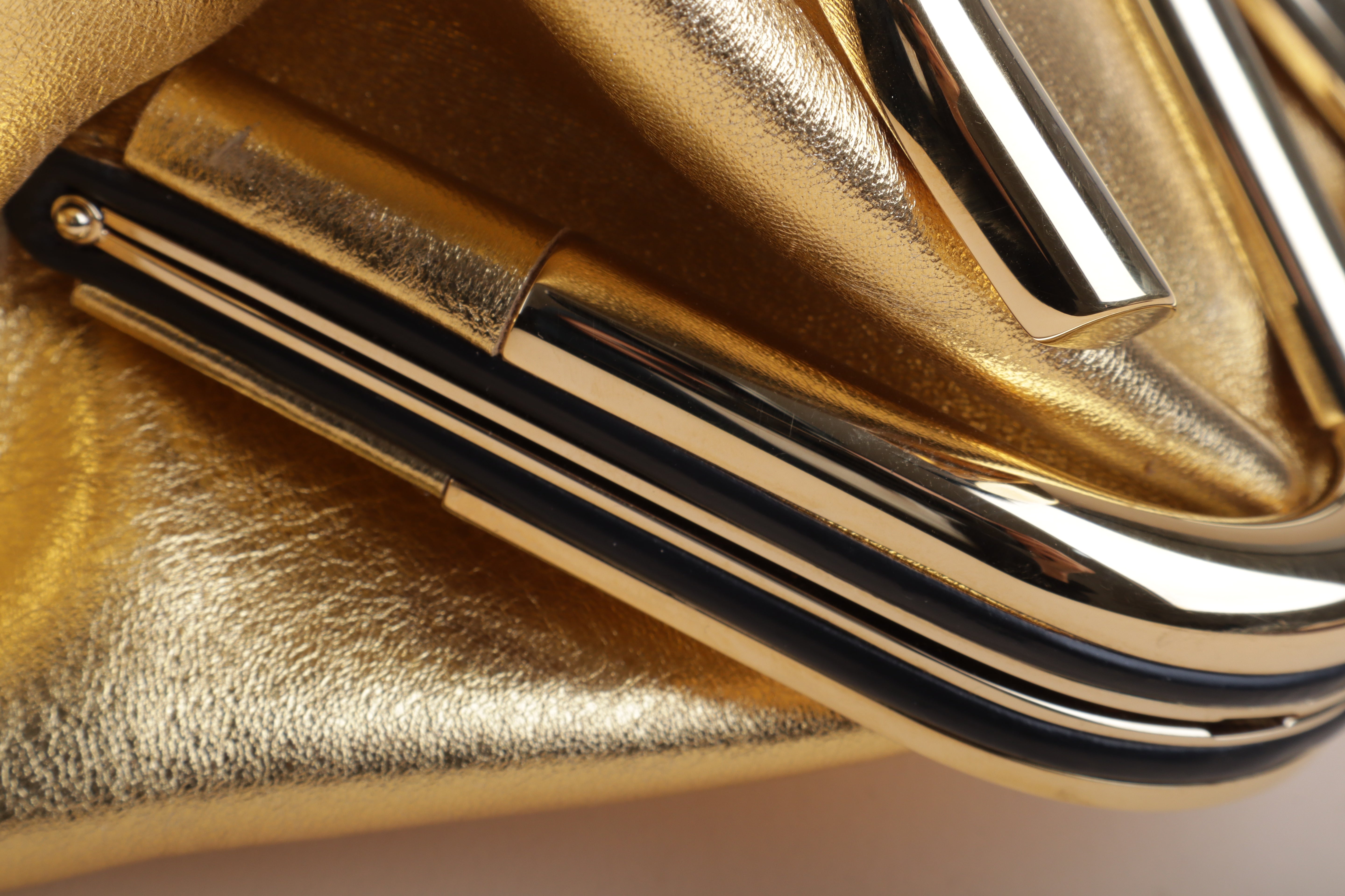 Valentino super Vee clutch and crossbody gold