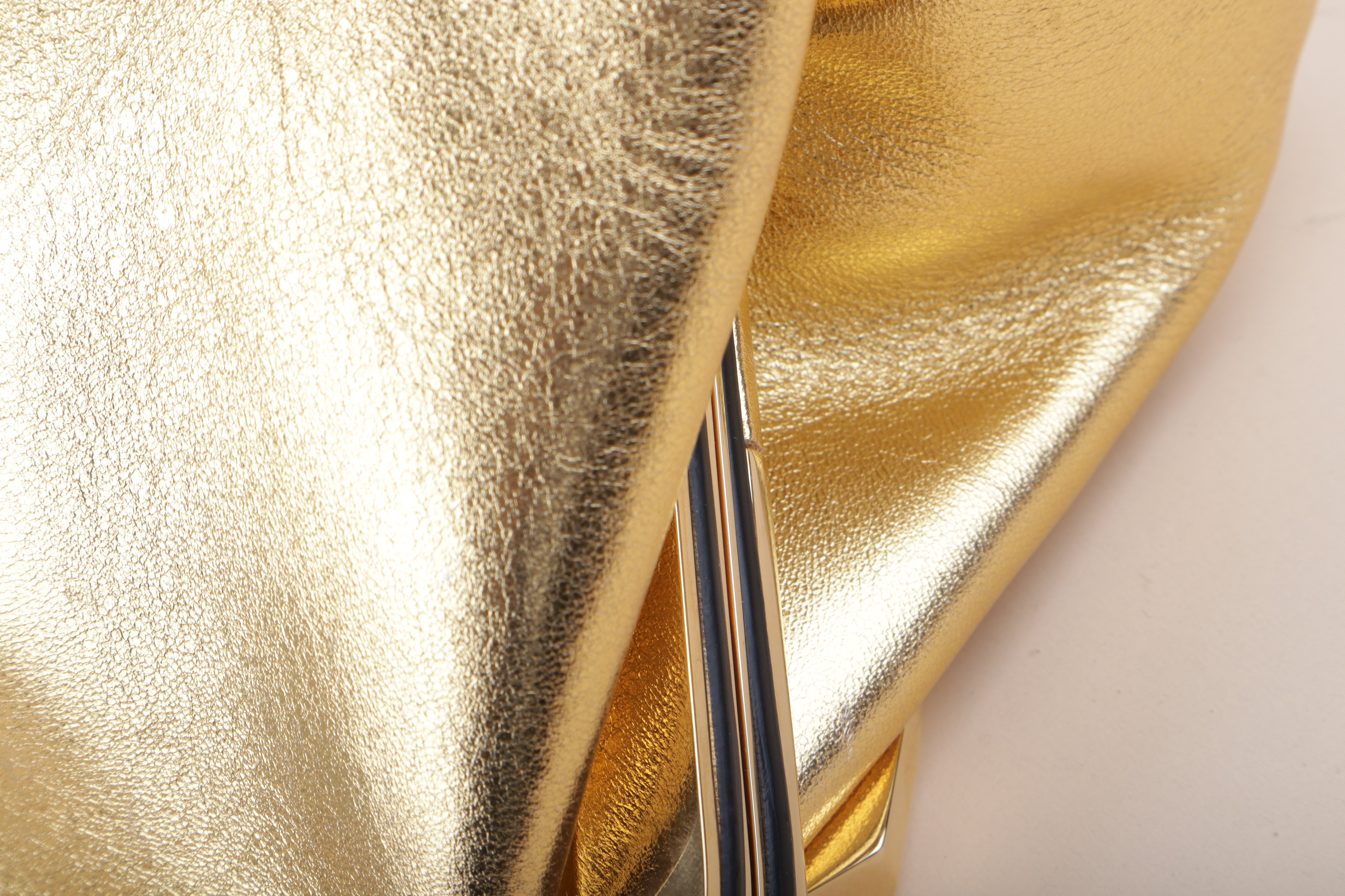Valentino super Vee clutch and crossbody gold