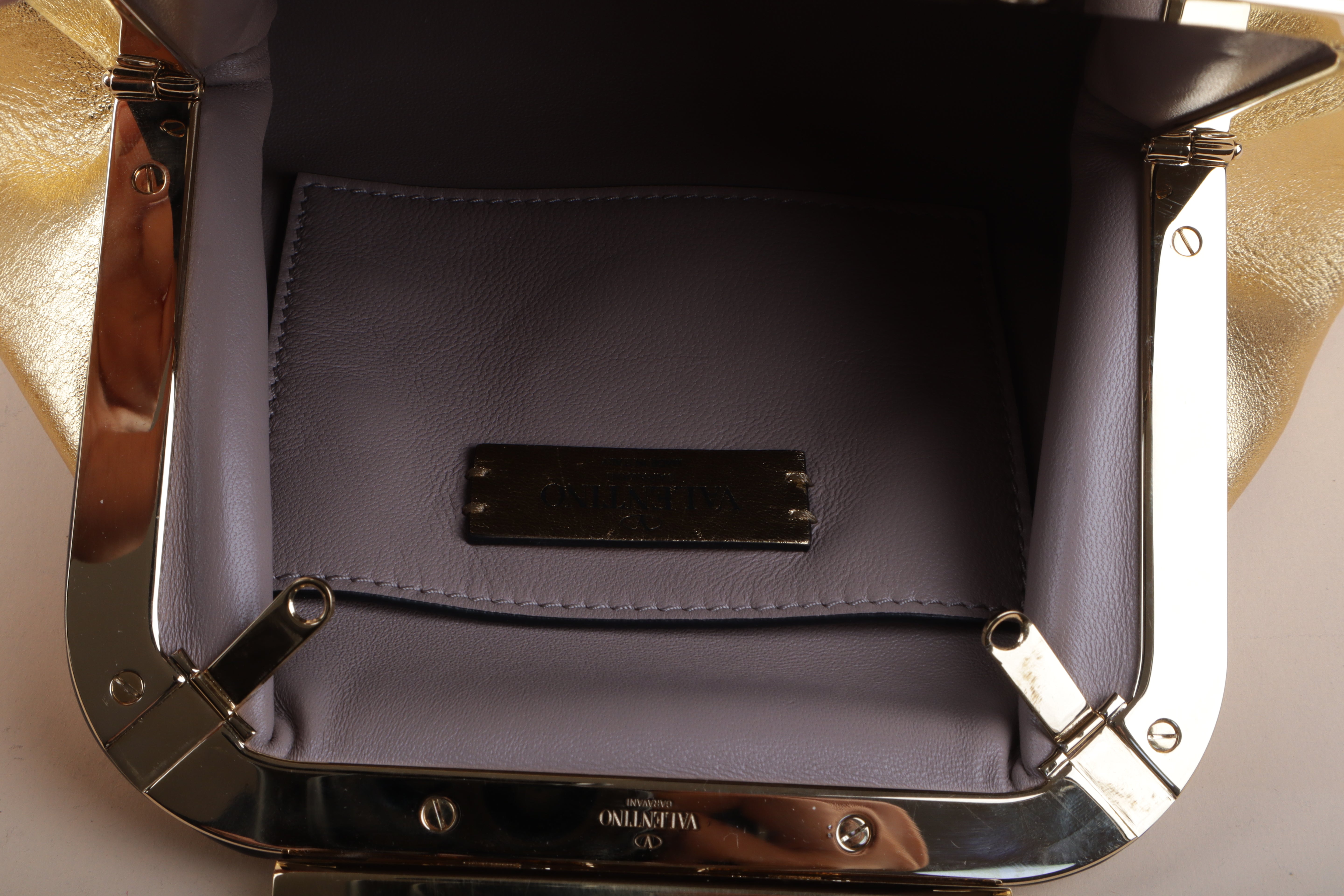 Valentino super Vee clutch and crossbody gold