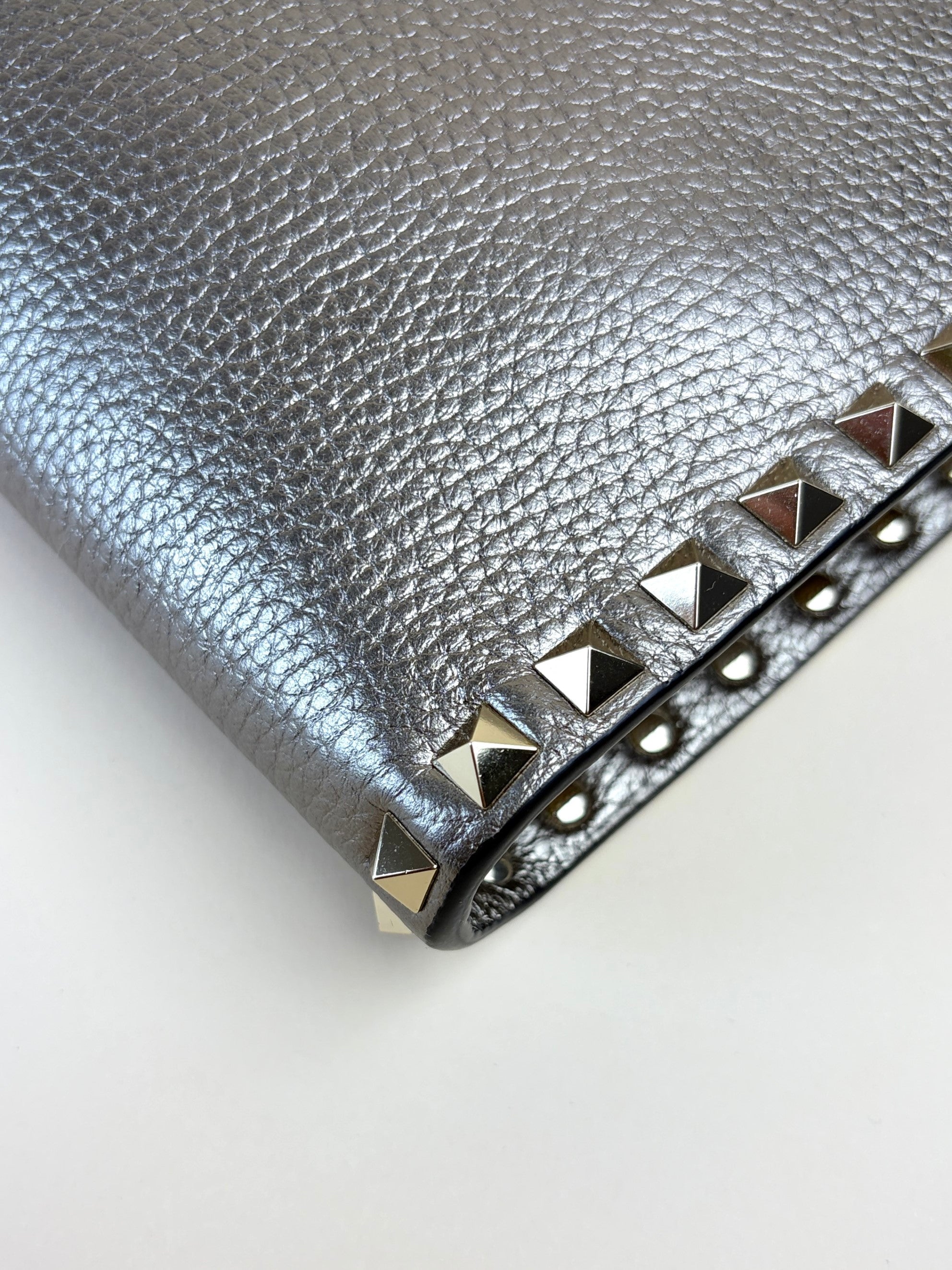 Valentino metallic pebbled calfskin medium Rock stud Clutch