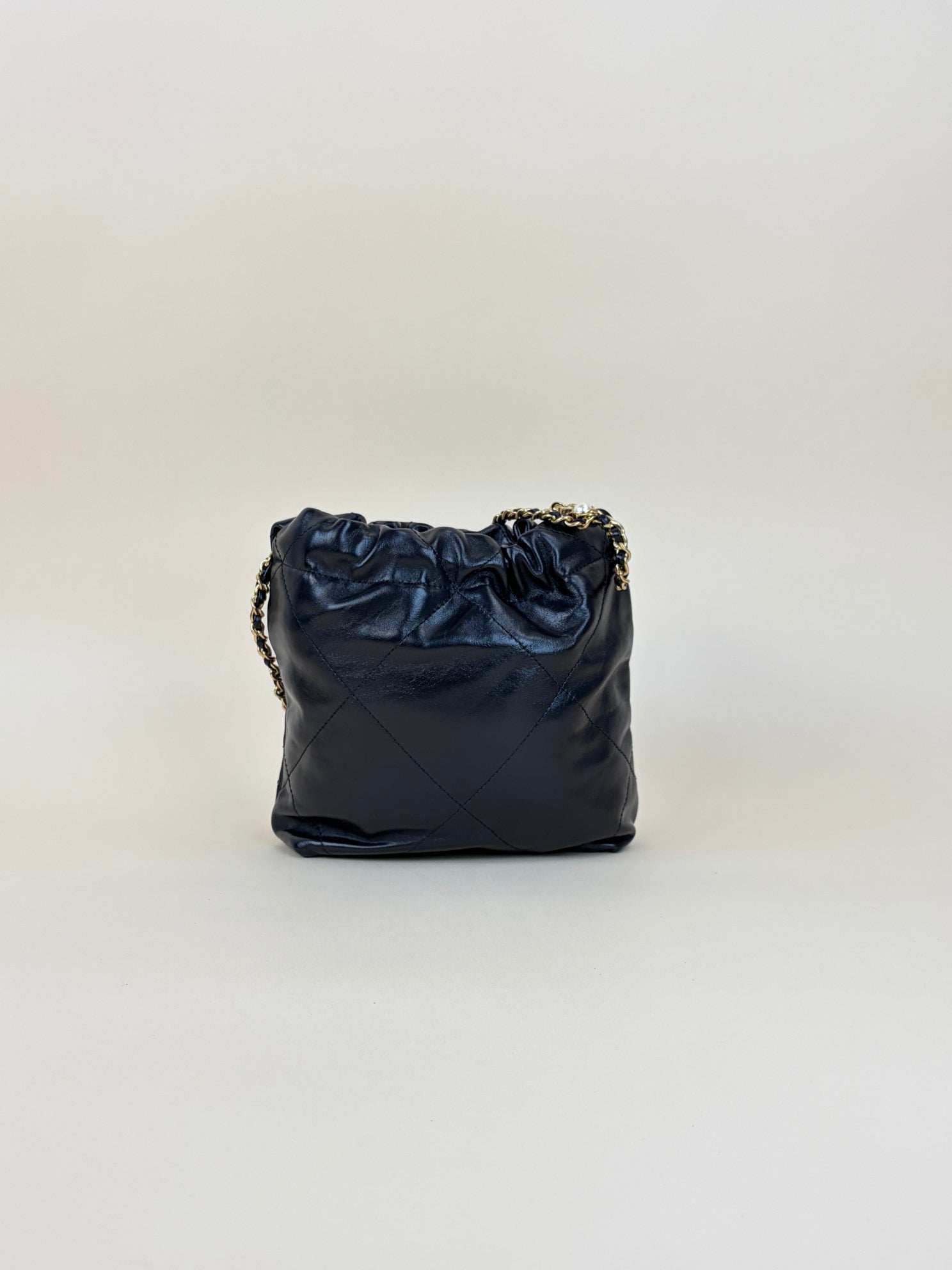 Chanel black shiny calfskin quilted pearl cc chain mini bag