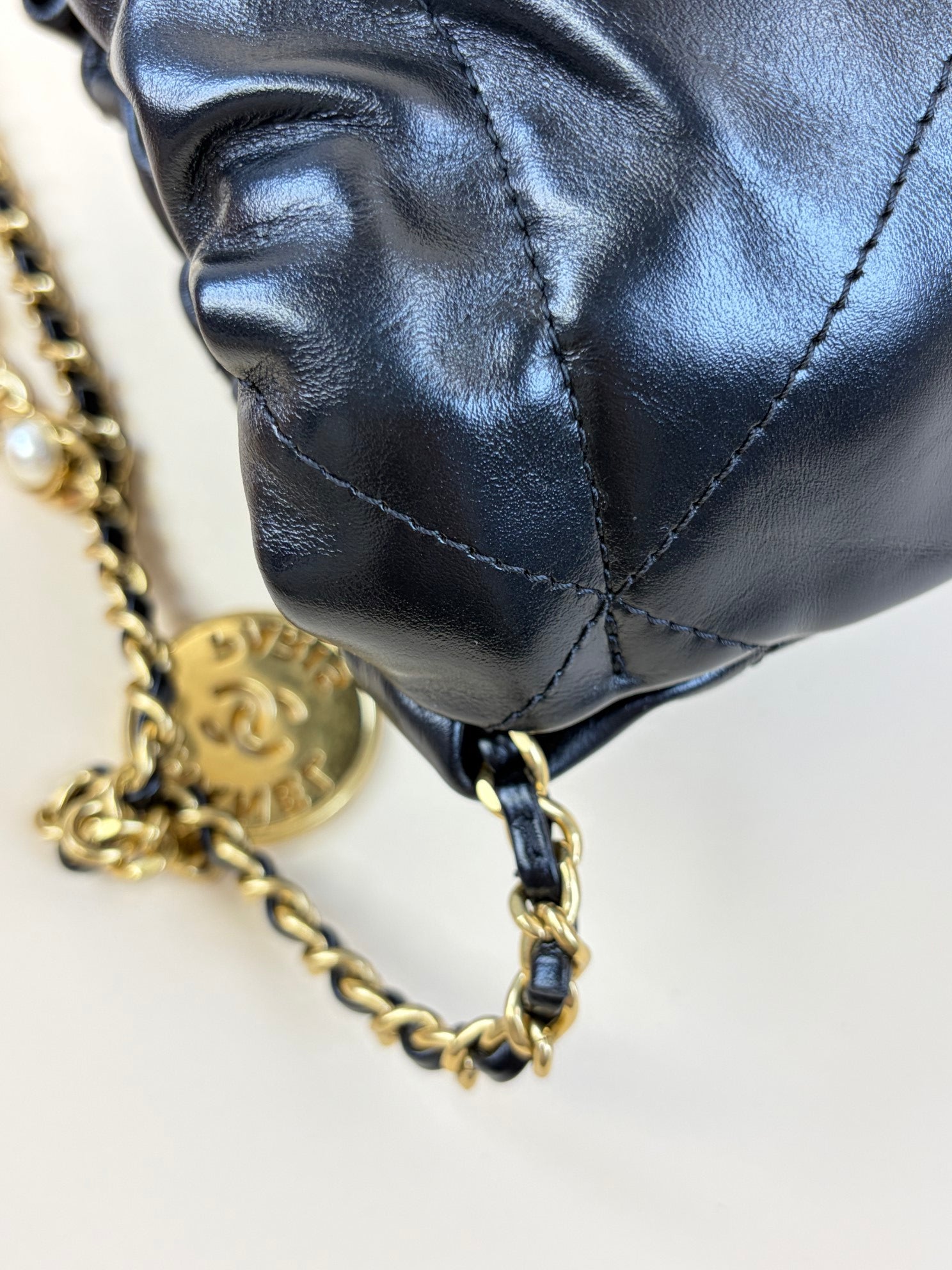 Chanel black shiny calfskin quilted pearl cc chain mini bag