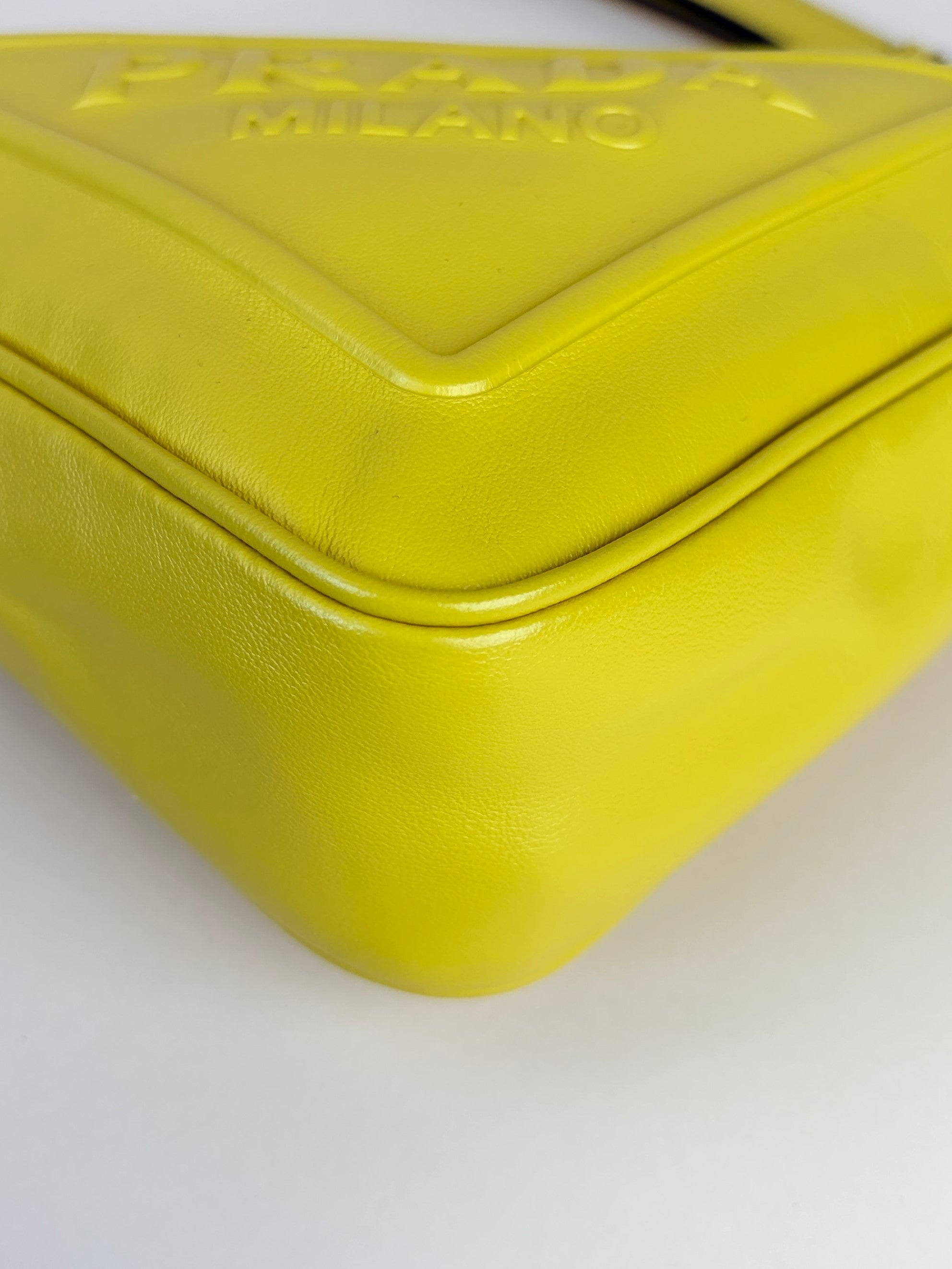 Prada sole grace lux yellow triangle wristlet pouch