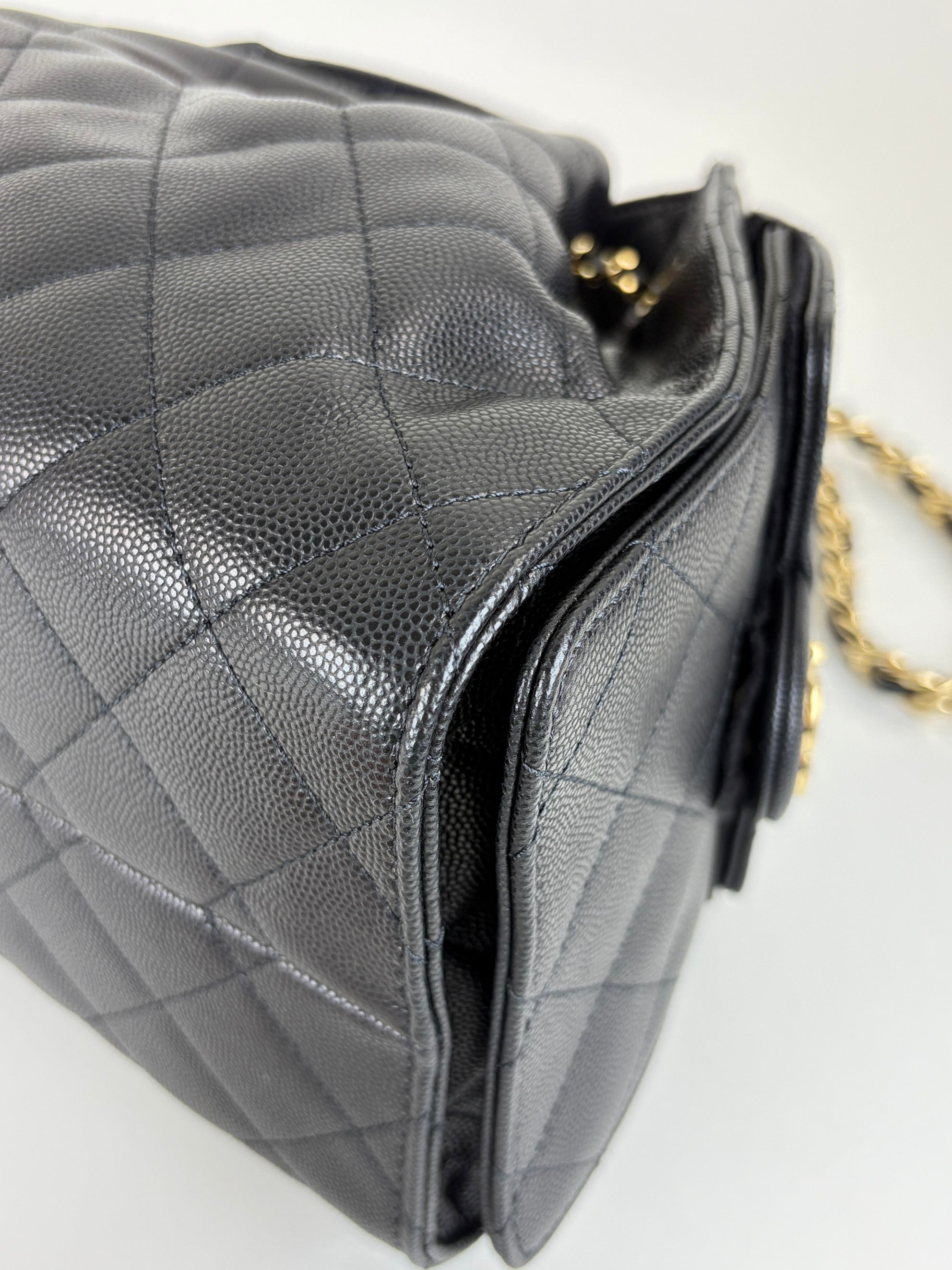Chanel black caviar leather Chanel 25 small hand bag