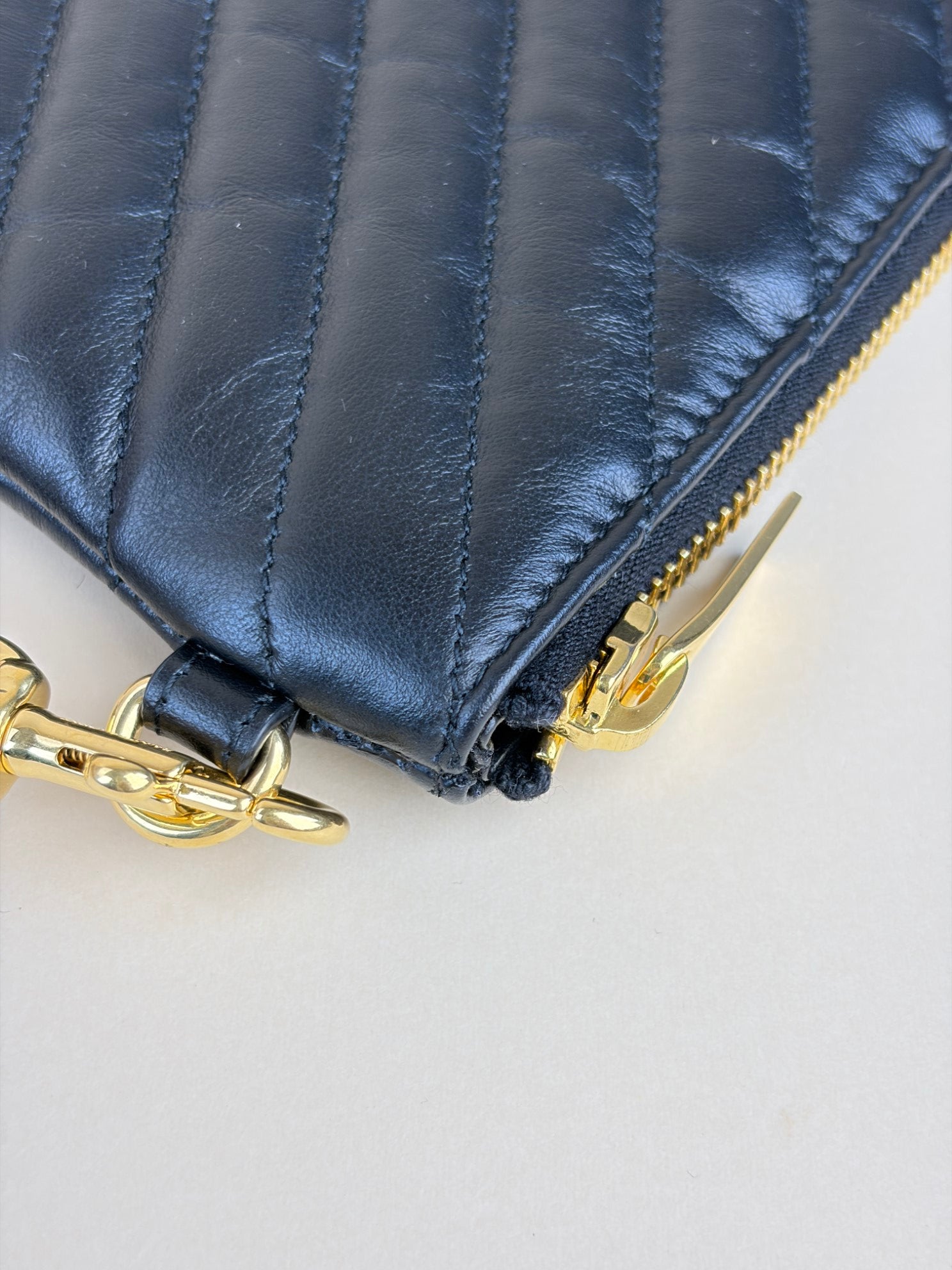 ysl black Cassandra matelassé tablet pouch
