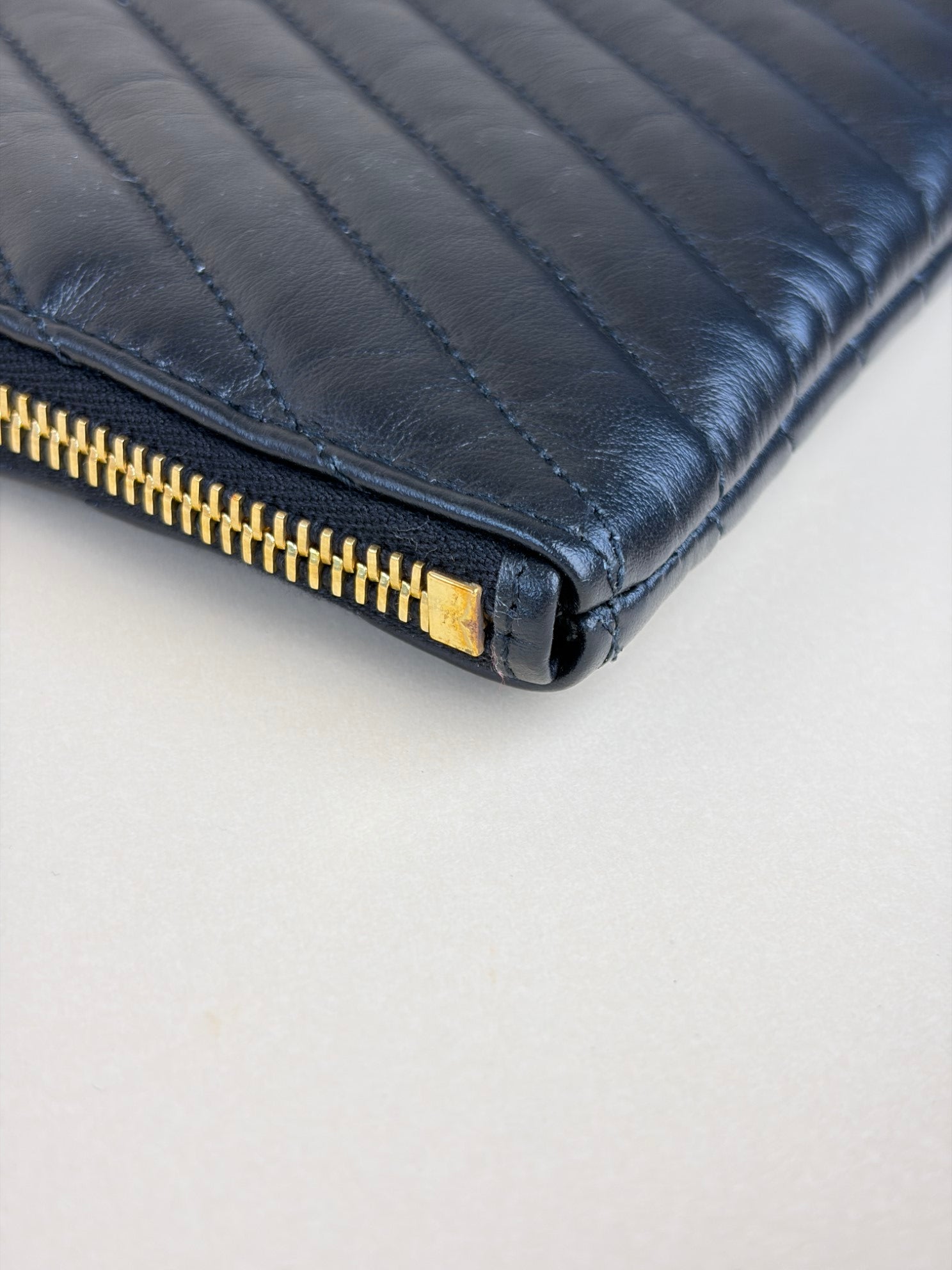 ysl black Cassandra matelassé tablet pouch
