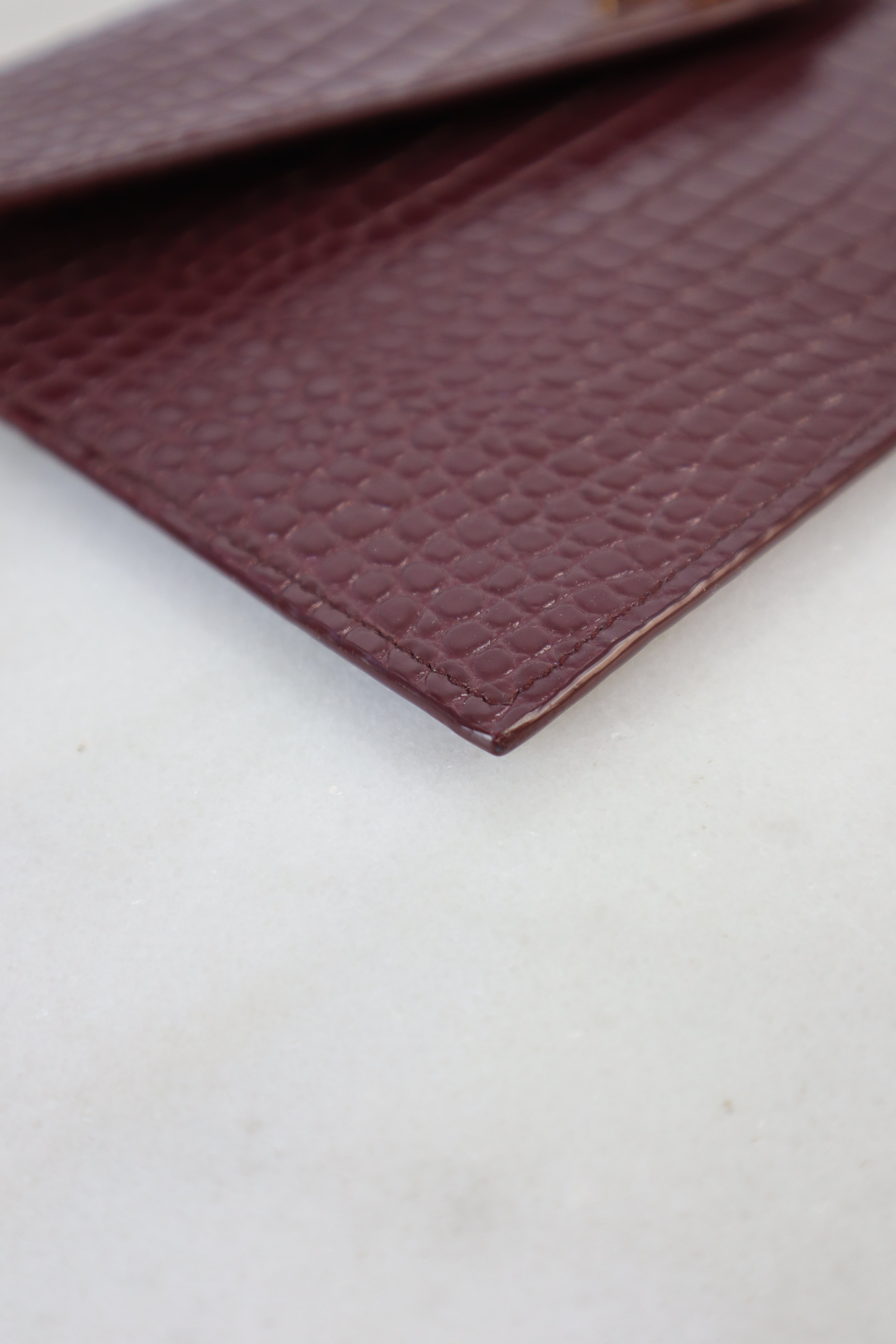 YSL Burgundy Croco Uptown Clutch
