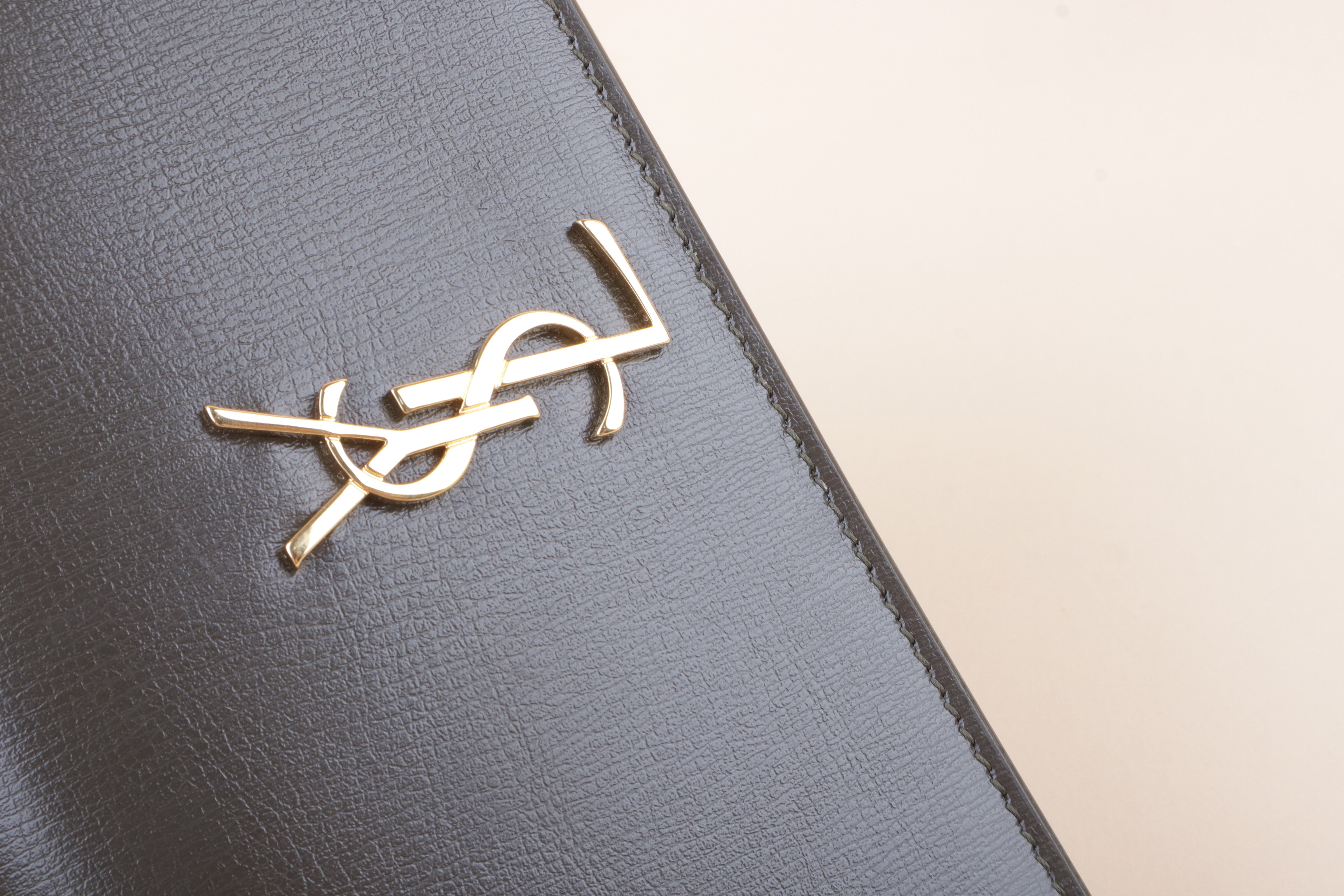 YSL Cassandre phone holder light musk