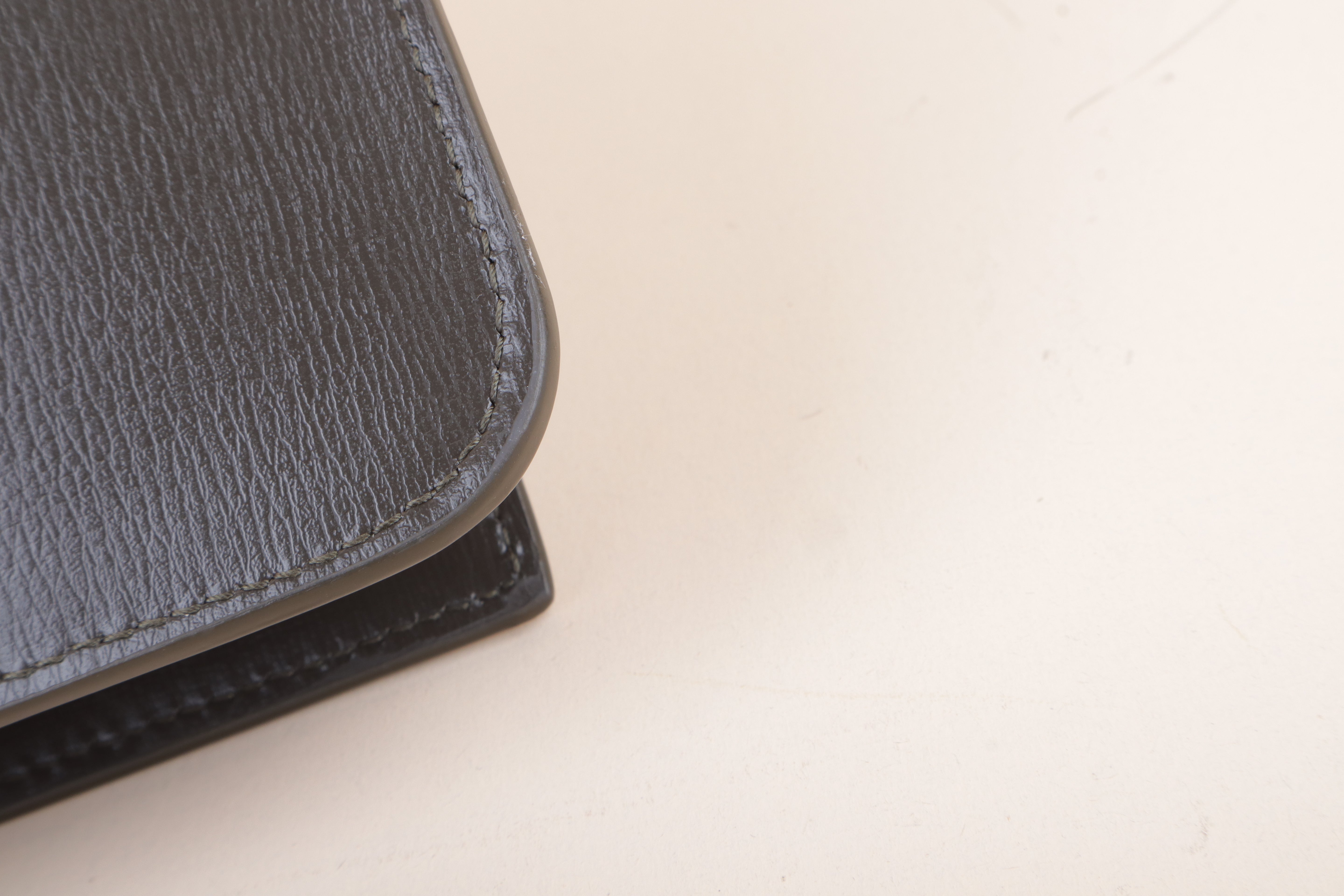 YSL Cassandre phone holder light musk