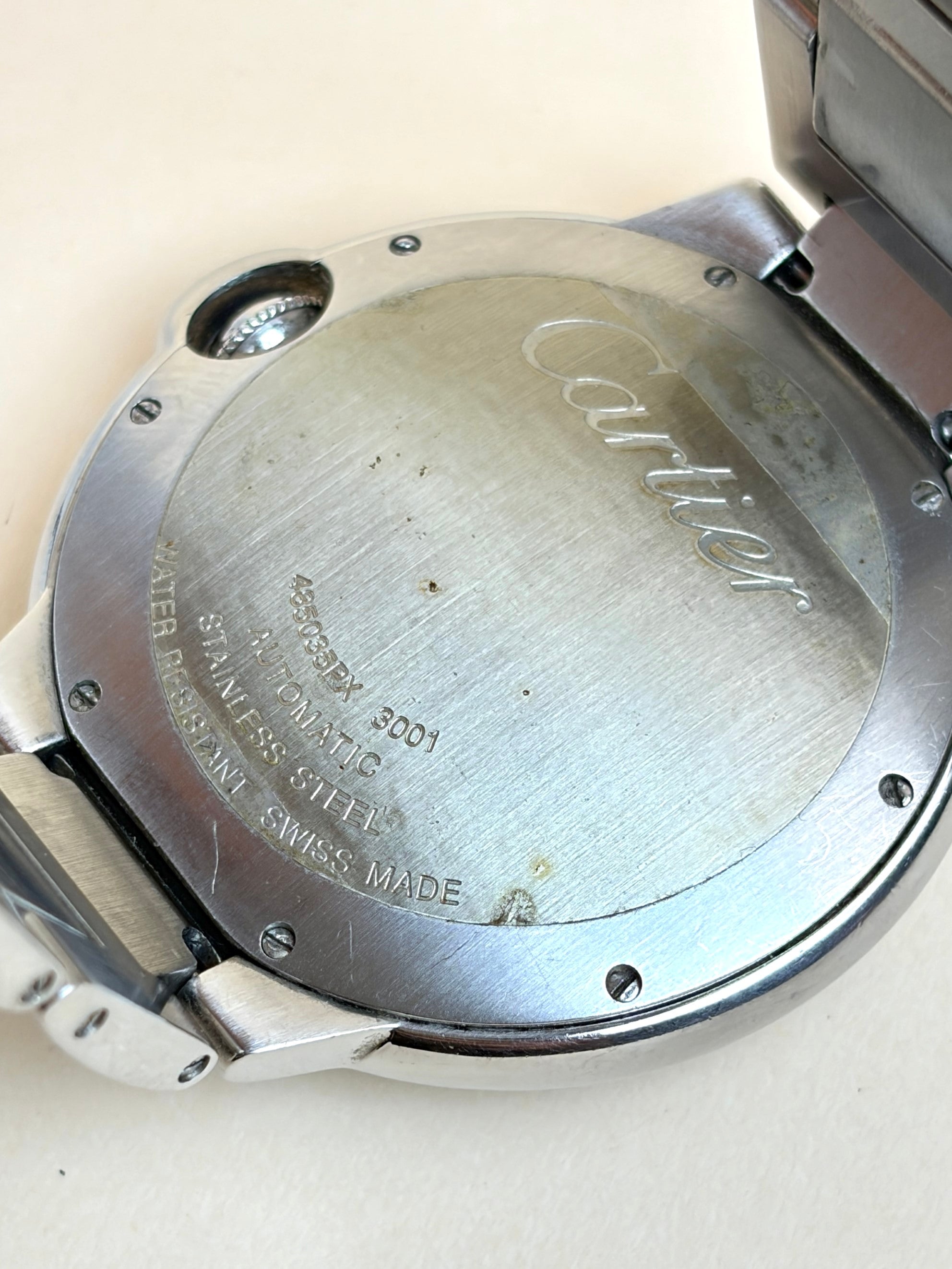 Cartier ballon blue de cartier watch steel bezel set