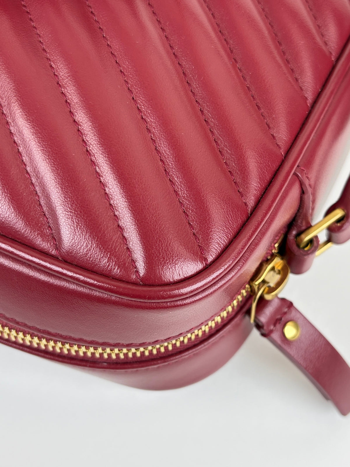 YSL red calfskin matelassé monogram Lou camera bag