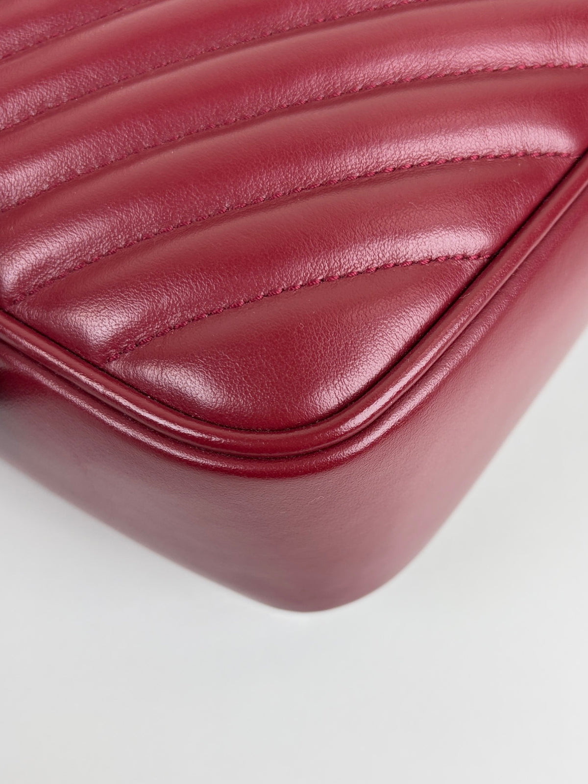 YSL red calfskin matelassé monogram Lou camera bag