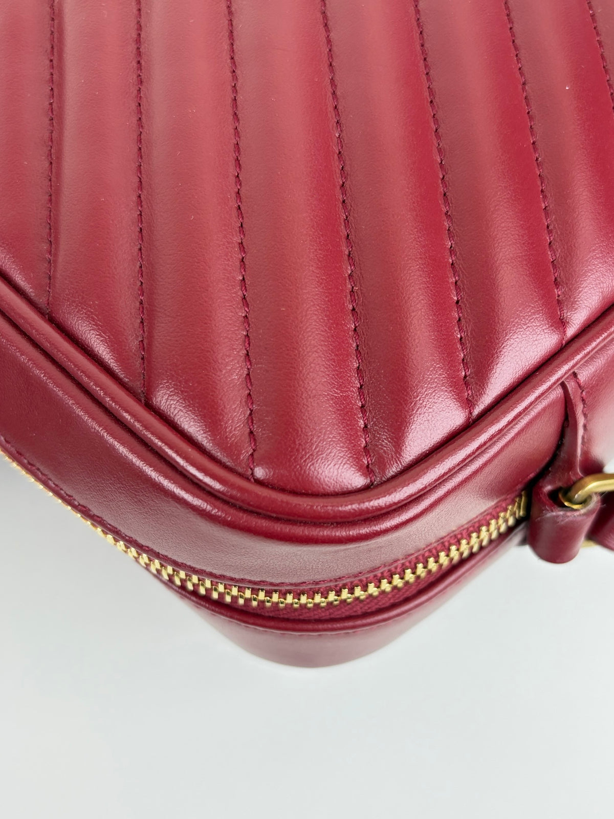 YSL red calfskin matelassé monogram Lou camera bag