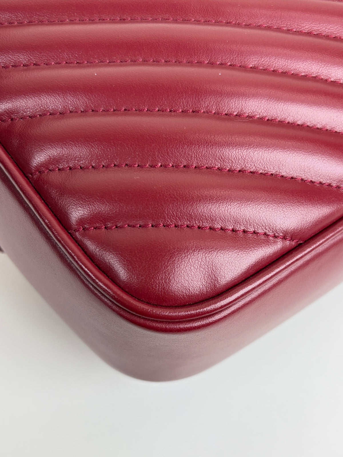 YSL red calfskin matelassé monogram Lou camera bag