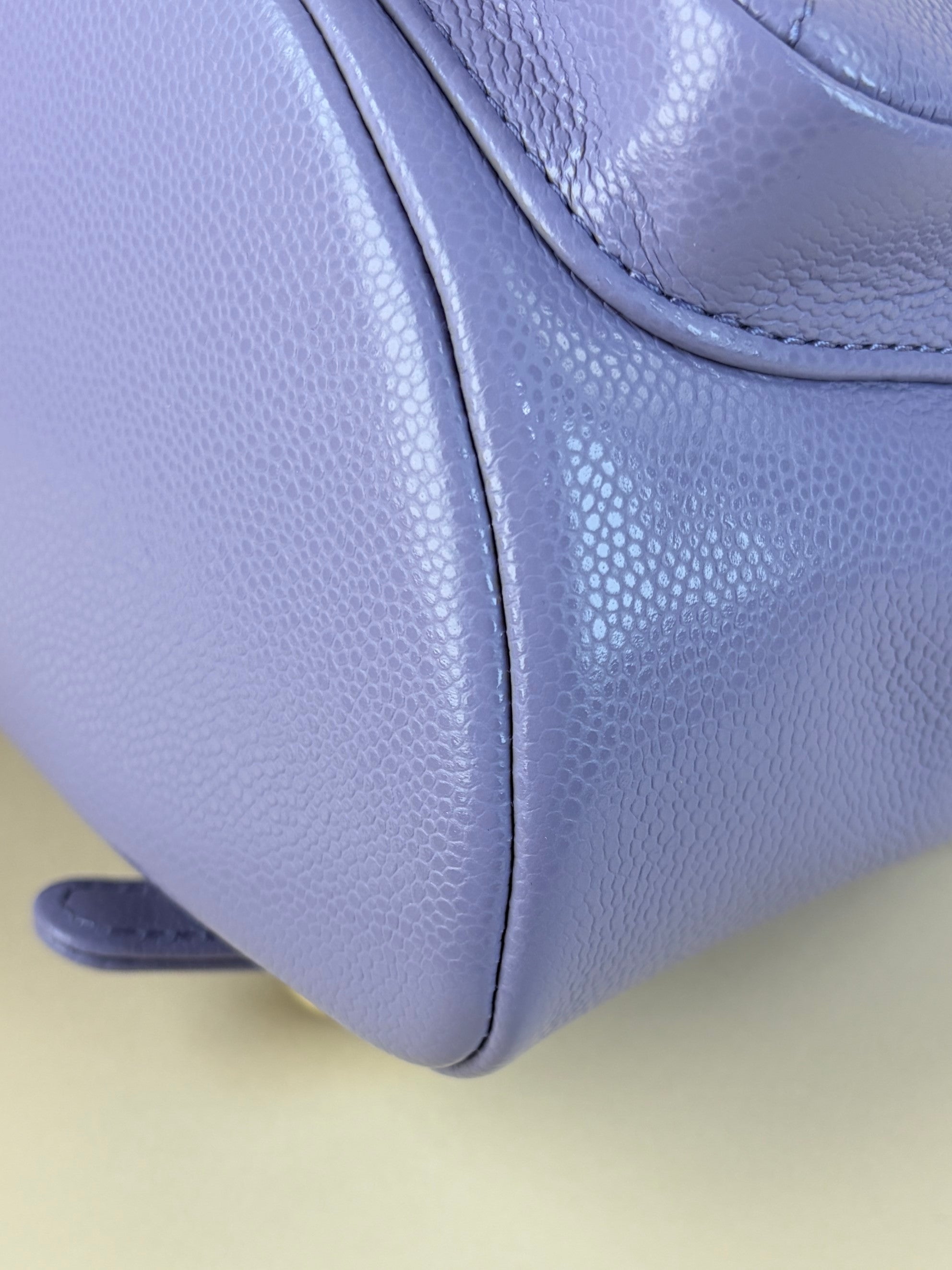 Chanel shiny caviar quilted small duma pockets drawstring backpack