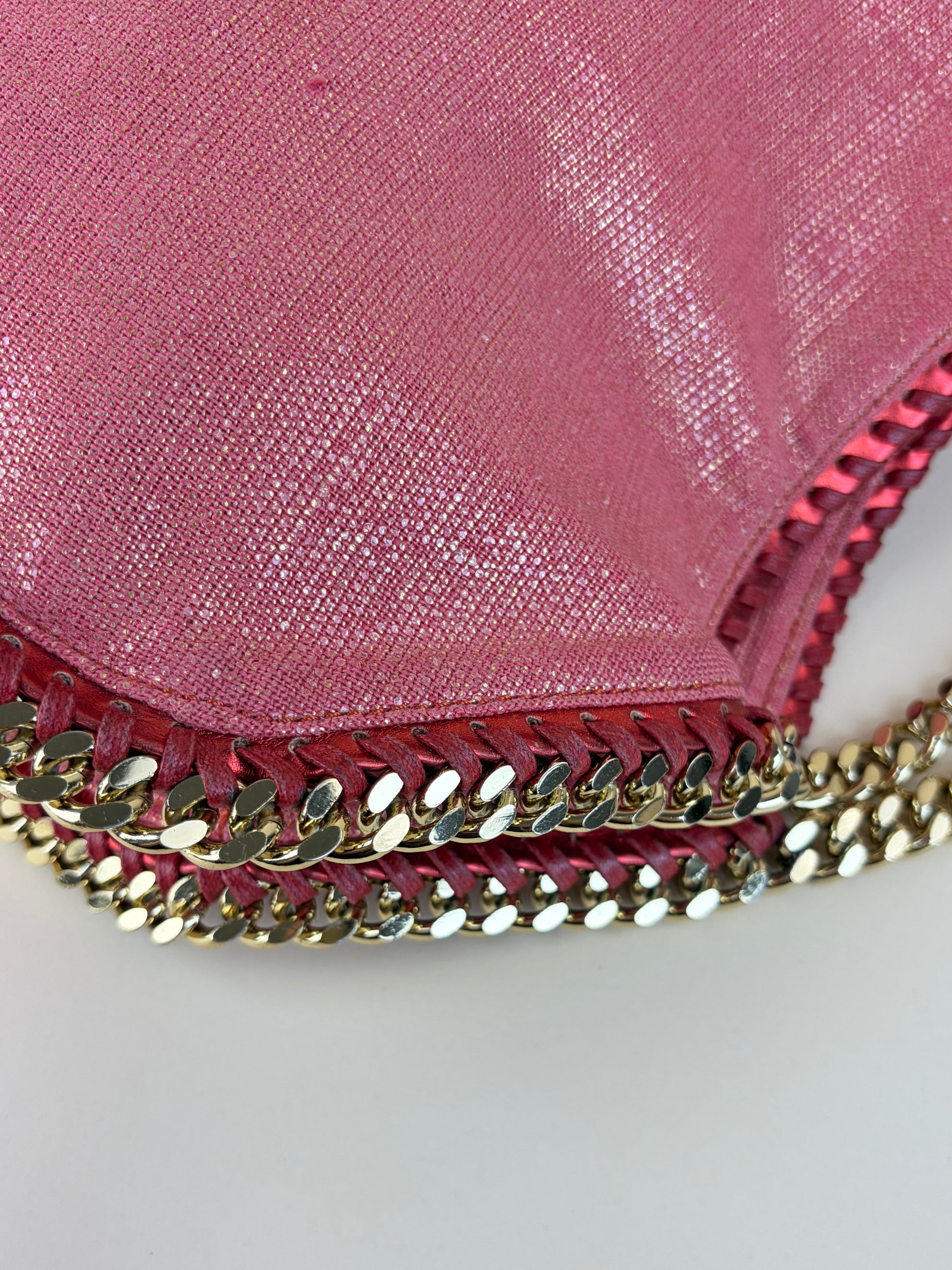 Stella McCartney PINK/red shiny and metallic trimmed leather fold over bag