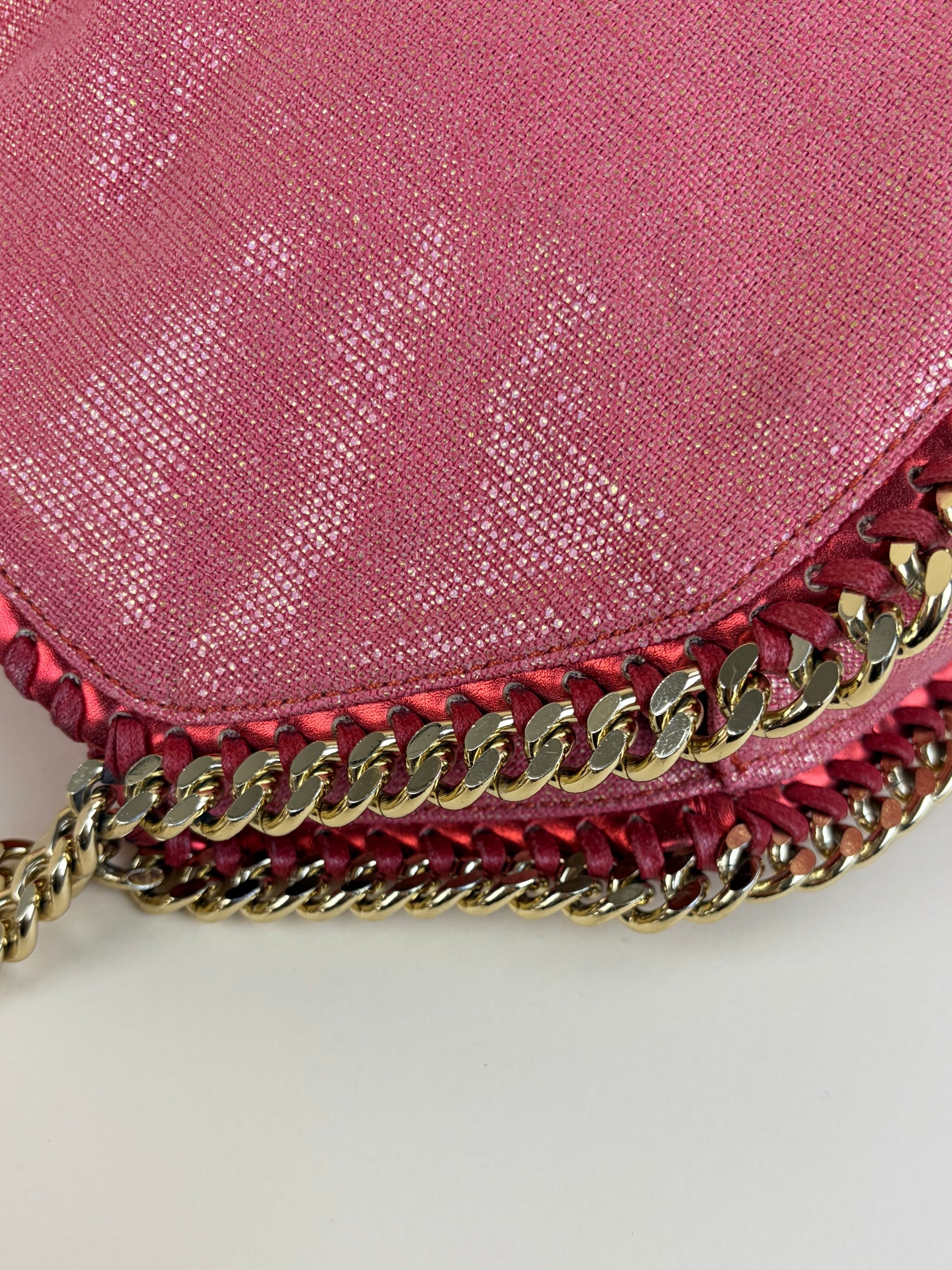 Stella McCartney PINK/red shiny and metallic trimmed leather fold over bag