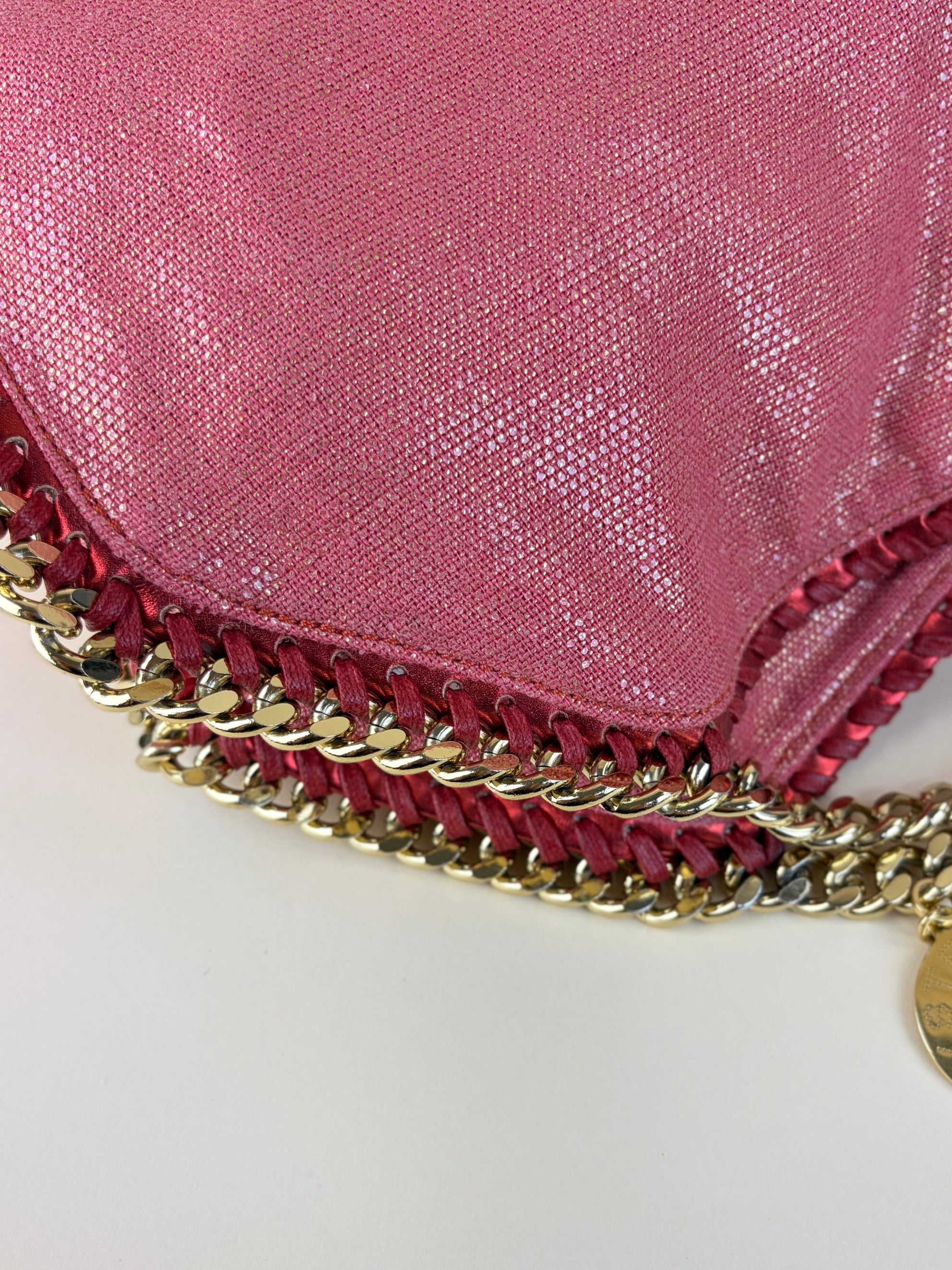 Stella McCartney PINK/red shiny and metallic trimmed leather fold over bag