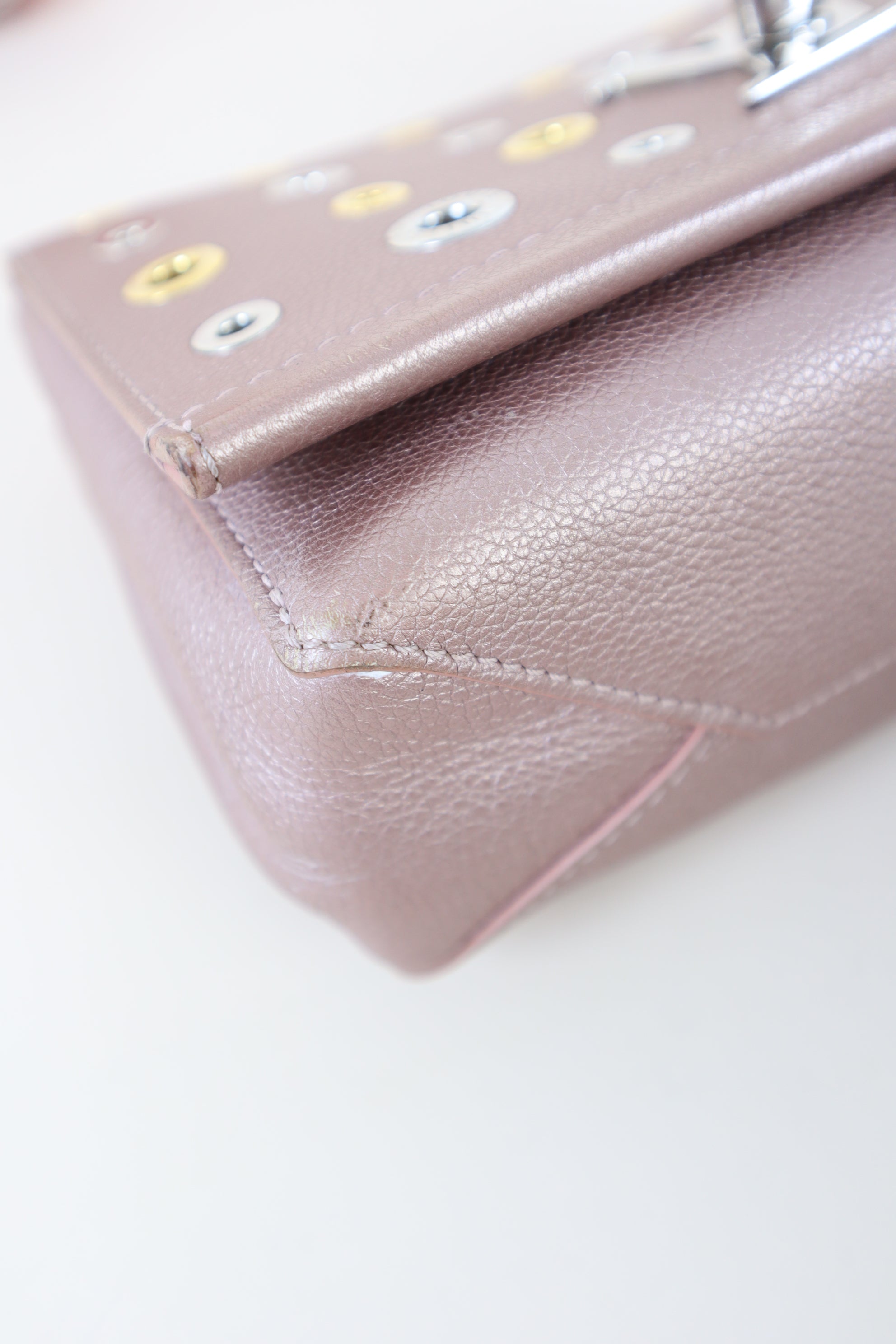Louis Vuitton Metallic Pink Eyelet Lock Me Bag