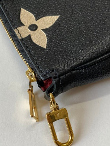 Louis Vuitton Bicolor Empreinte Monogram Giant Multi Pochette