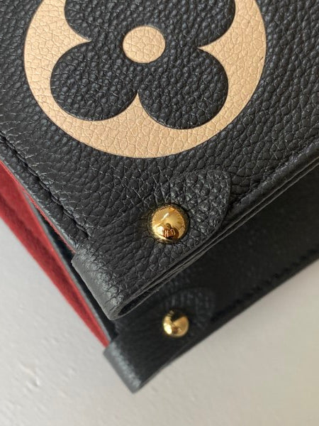 Louis Vuitton Bicolor Monogram Empreinte Giant Onthego Bag