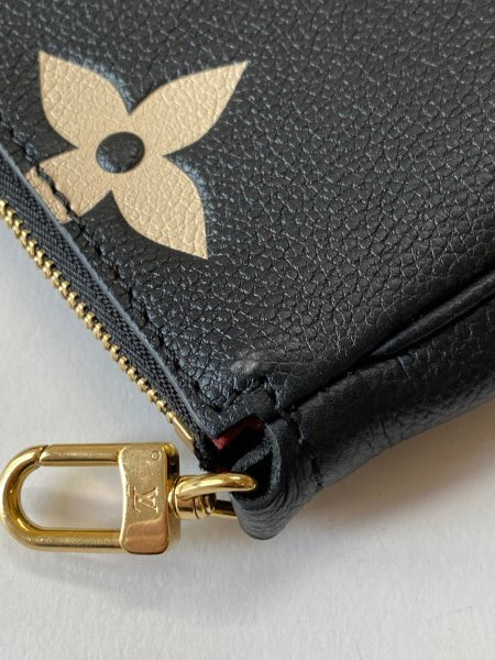 Louis Vuitton Bicolor Empreinte Monogram Giant Multi Pochette