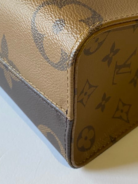 Louis Vuitton Monogram Reverse Onthego PM Bag