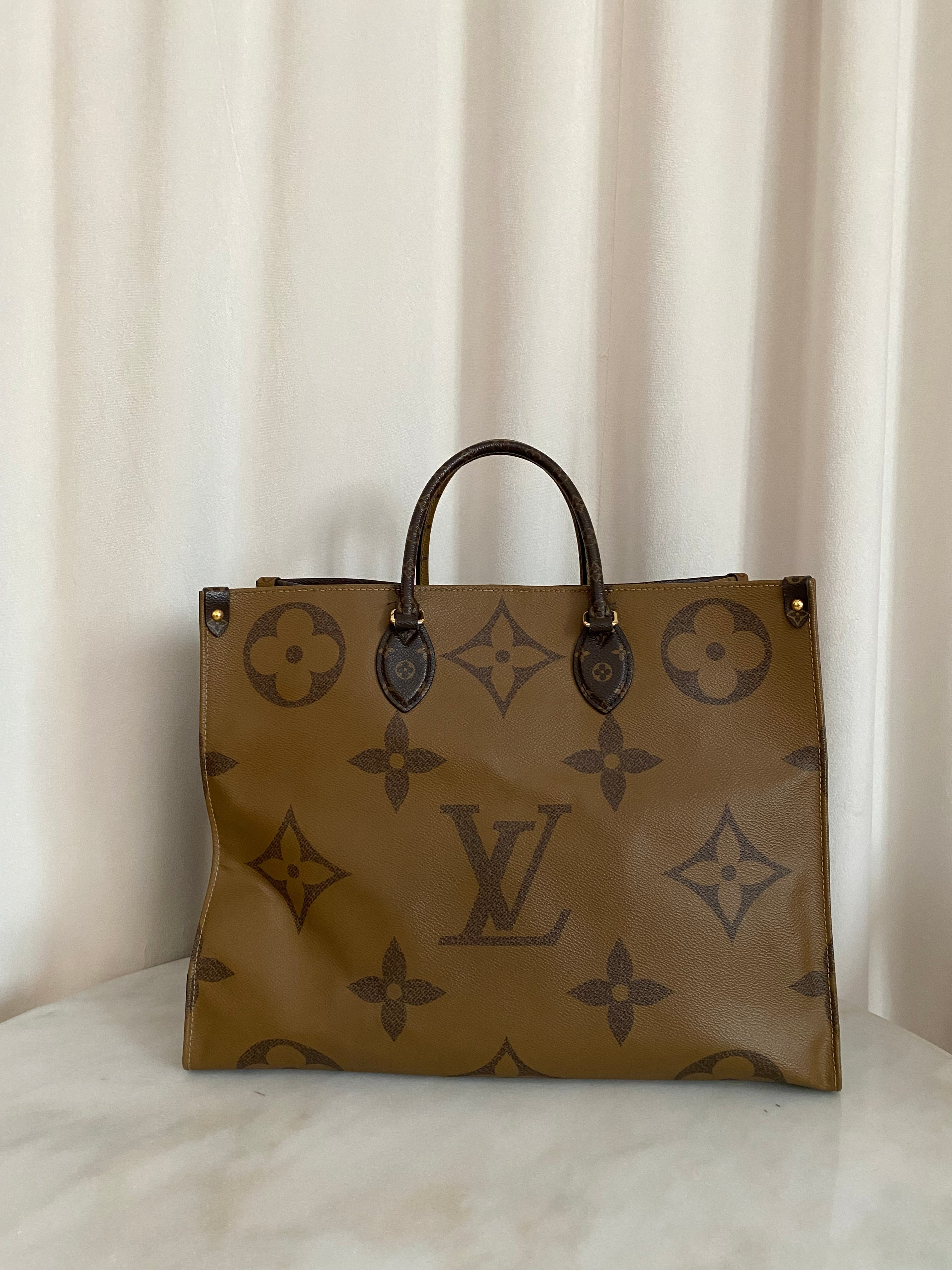 Louis Vuitton Monogram Reverse Onthego GM Bag