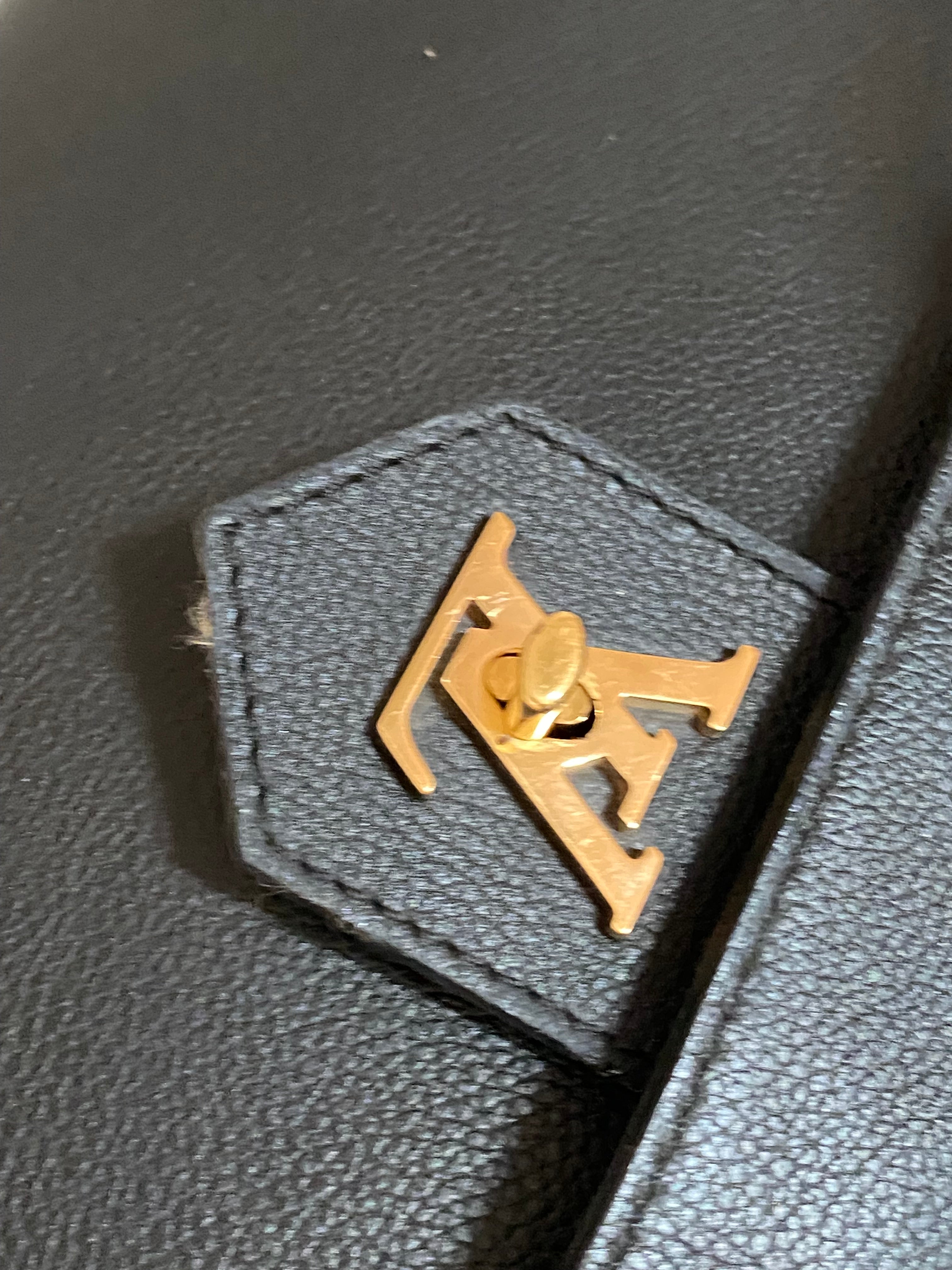 Louis Vuitton Black Lock Me Bag