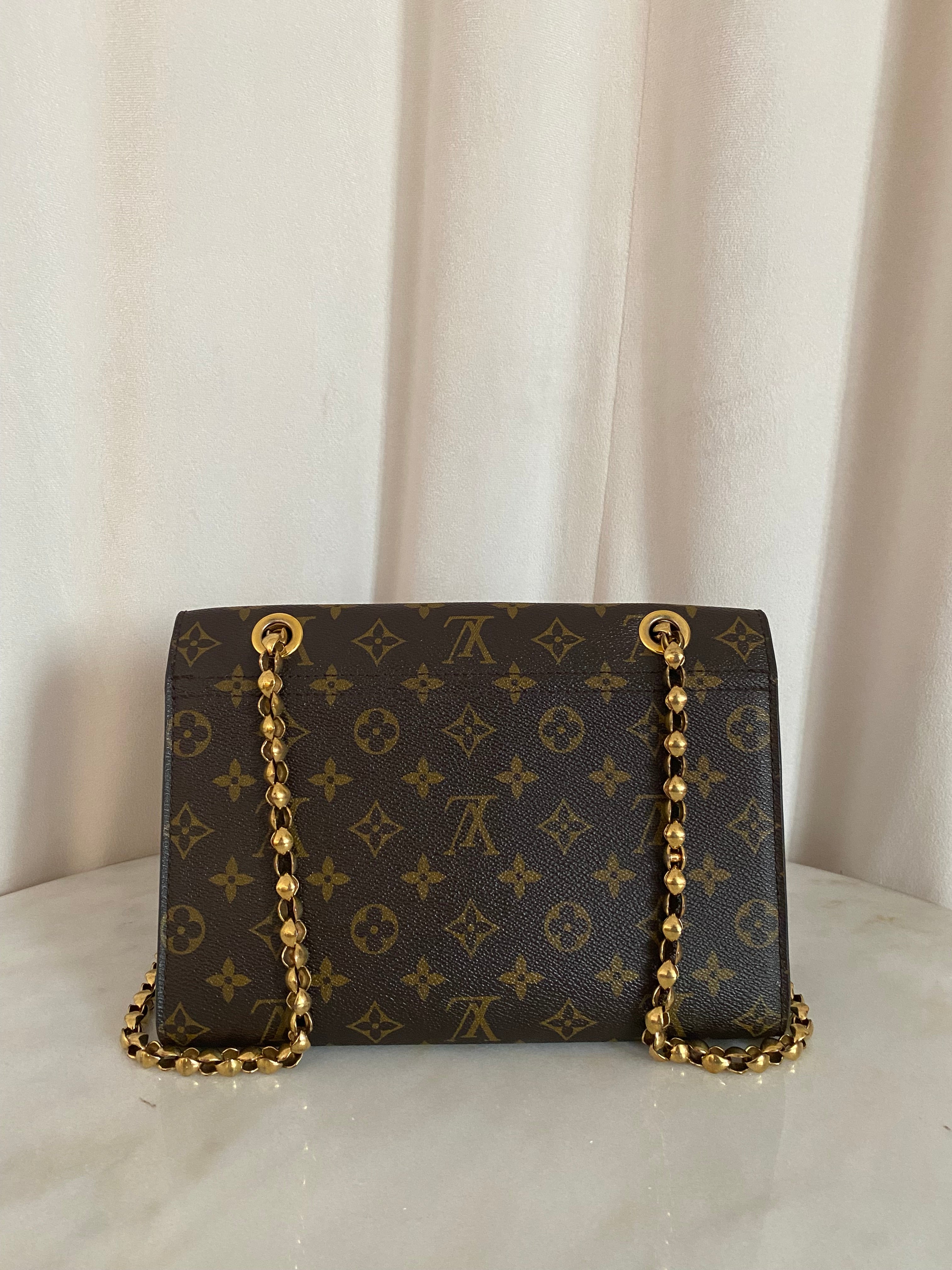 Louis Vuitton Monogram Black Victoire Shoulder Bag