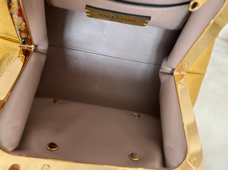 Valentino Gold Super V Clutch