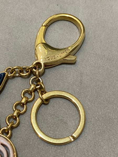 Louis Vuitton Gold Tone Resin Naif Bag Charm Key Holder – The