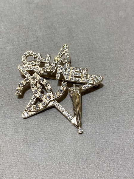 Chanel Gold Star Brooch