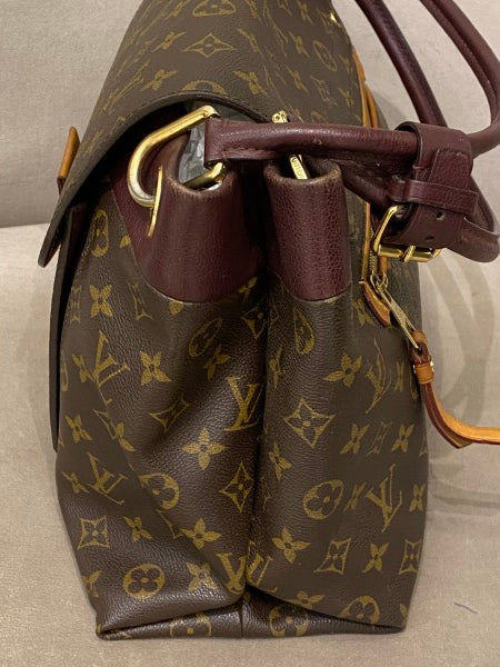 Louis Vuitton Olympe handbag in brown monogram canvas and burgundy