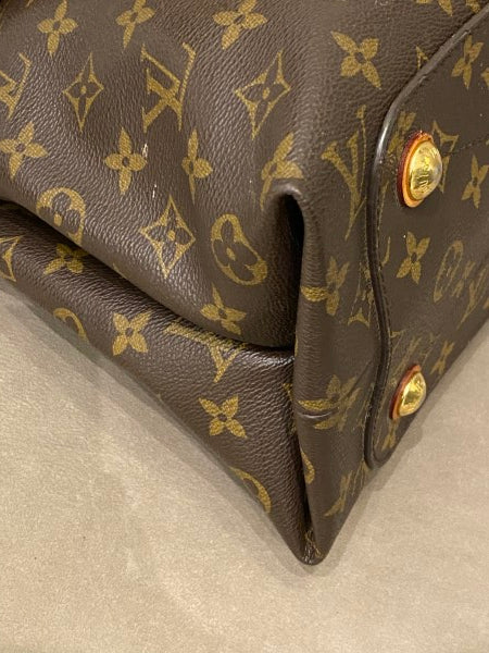 Louis Vuitton Olympe handbag in brown monogram canvas and burgundy